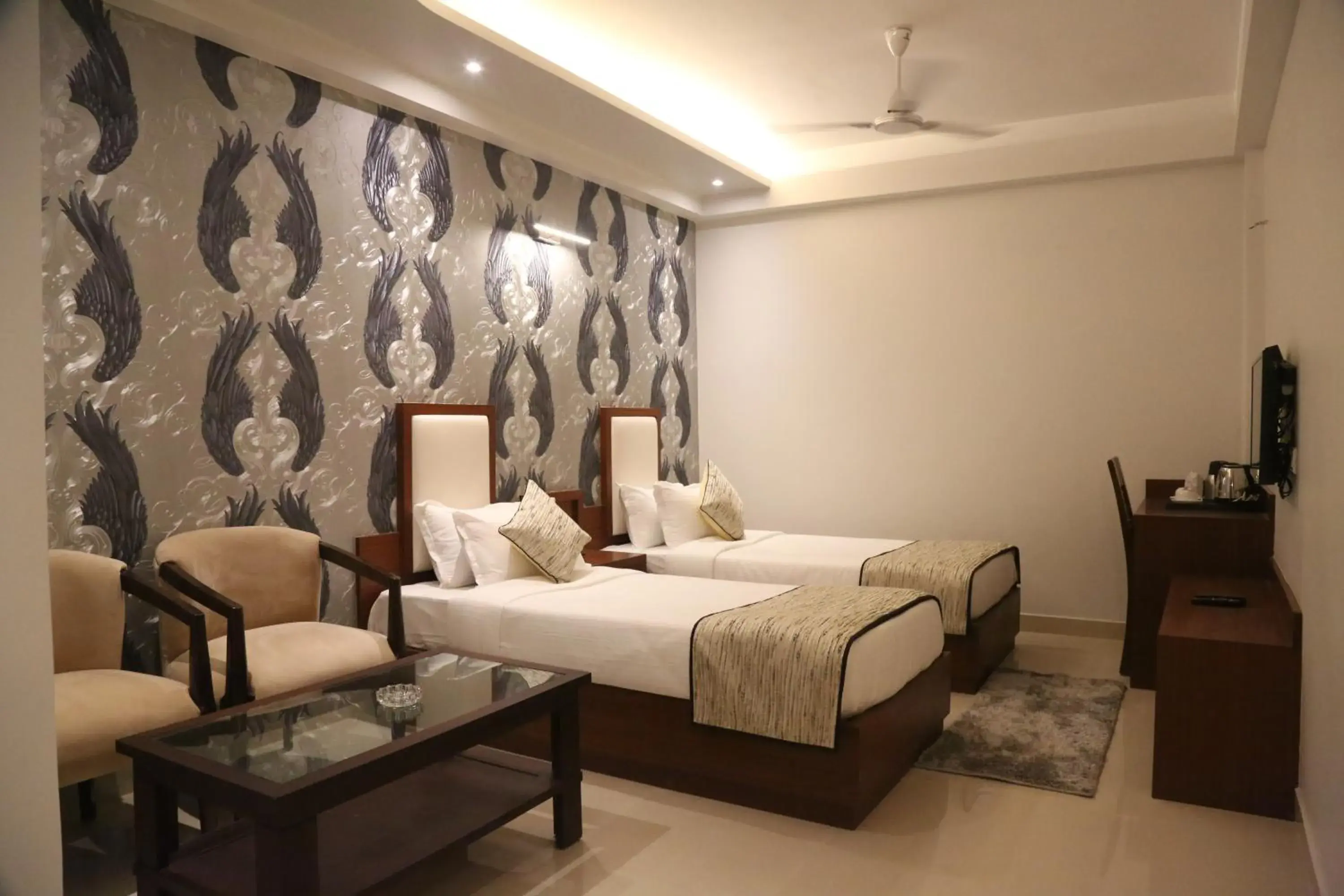 Photo of the whole room, Bed in Hotel Varanasi Inn