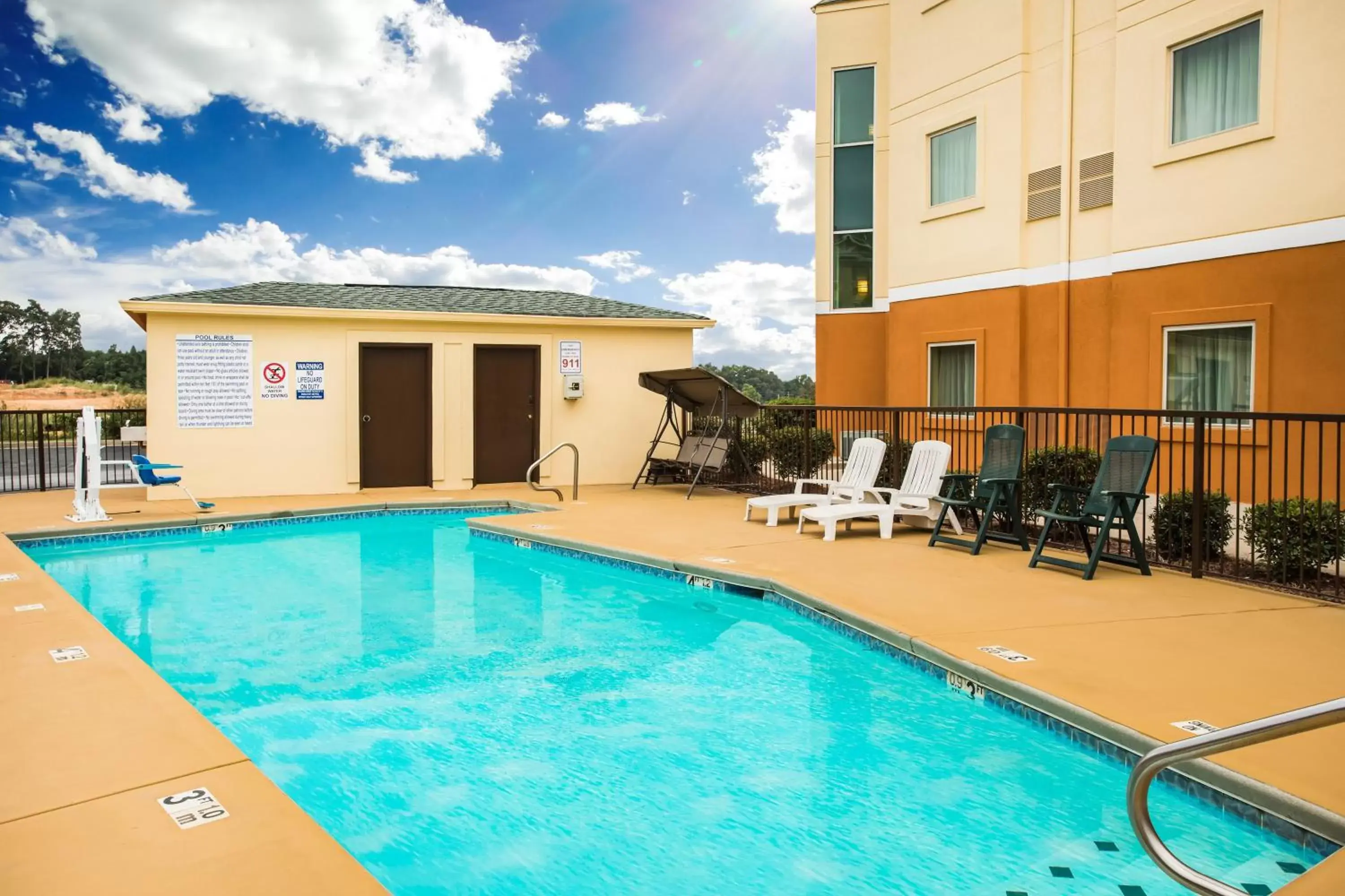 Swimming Pool in Days Inn & Suites by Wyndham Augusta Near Fort Gordon