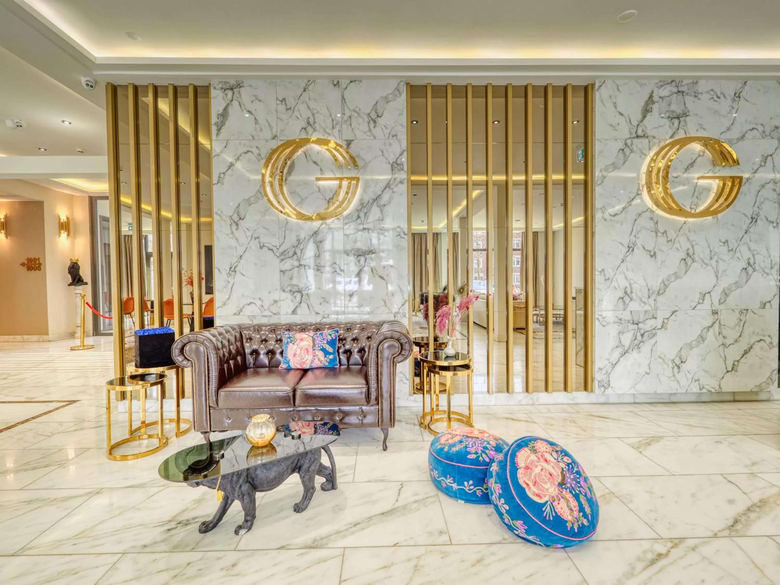 Lobby or reception in Triple G Hotels