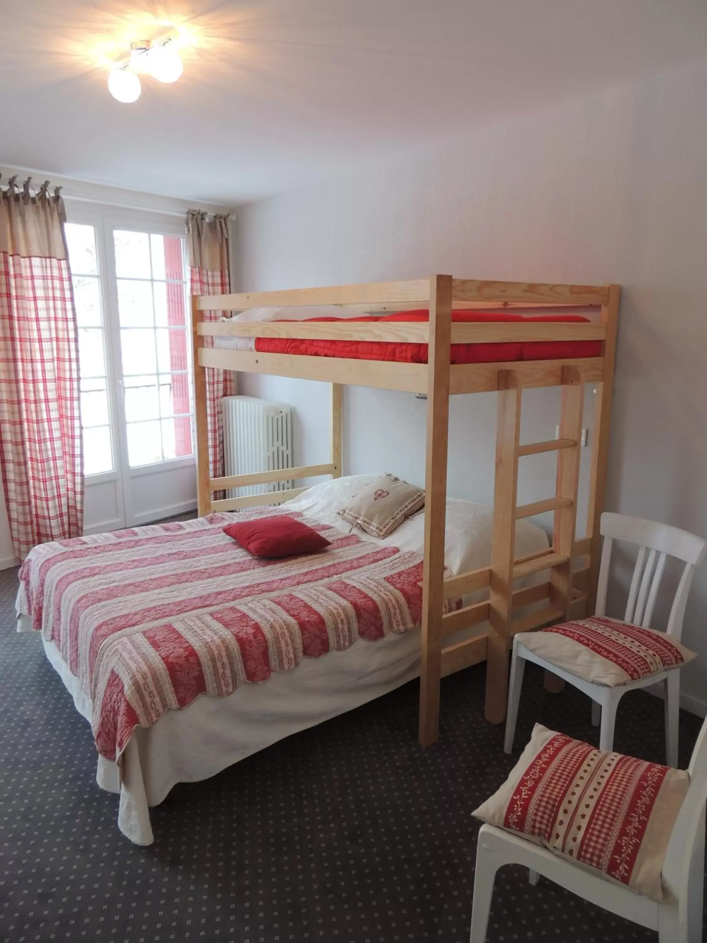 Photo of the whole room, Bunk Bed in Hôtel Restaurant du Plomb du Cantal