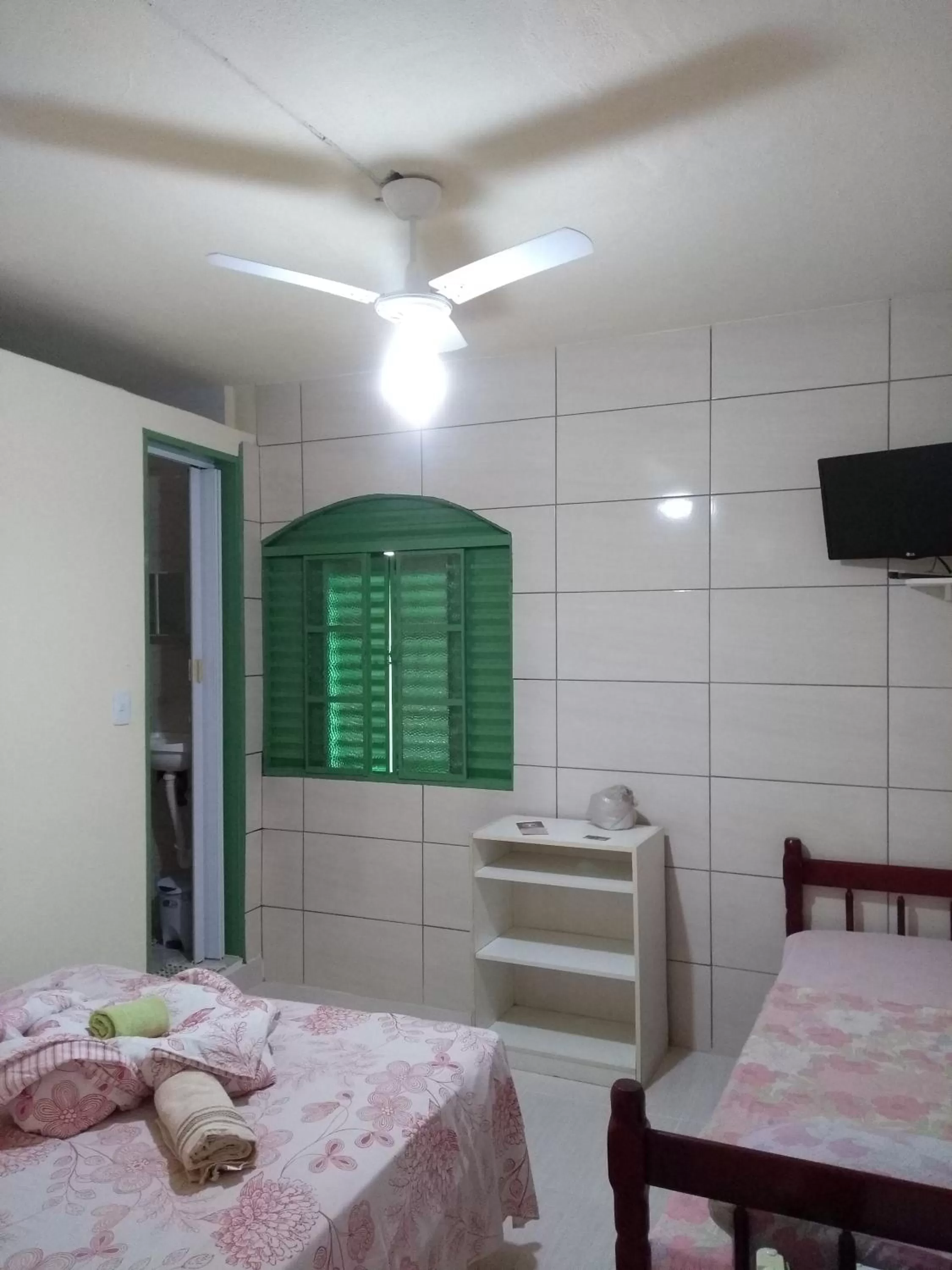 Property building, Bed in Pousada Encanto e Magia