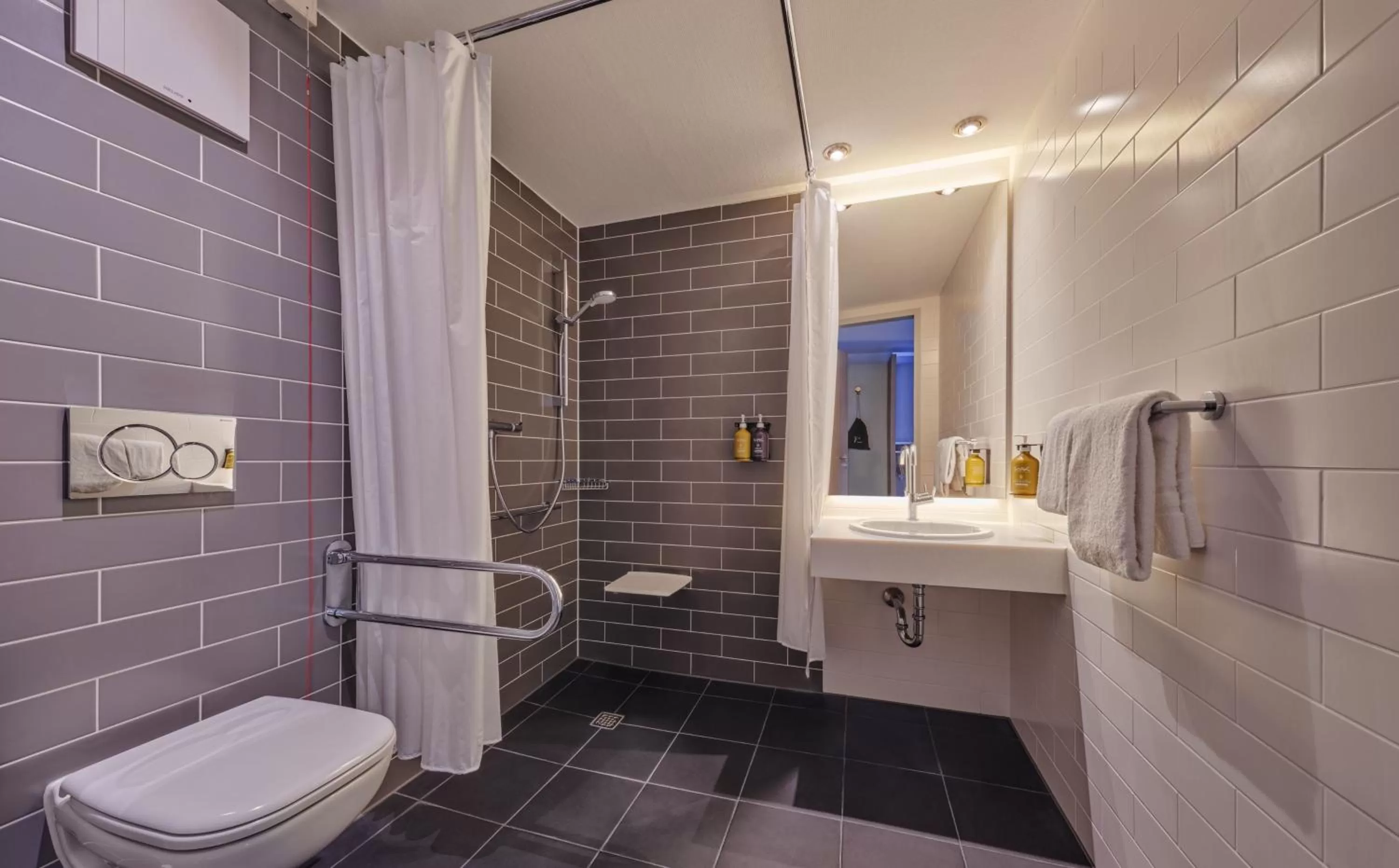 Bathroom in Holiday Inn Express Cologne Muelheim by IHG