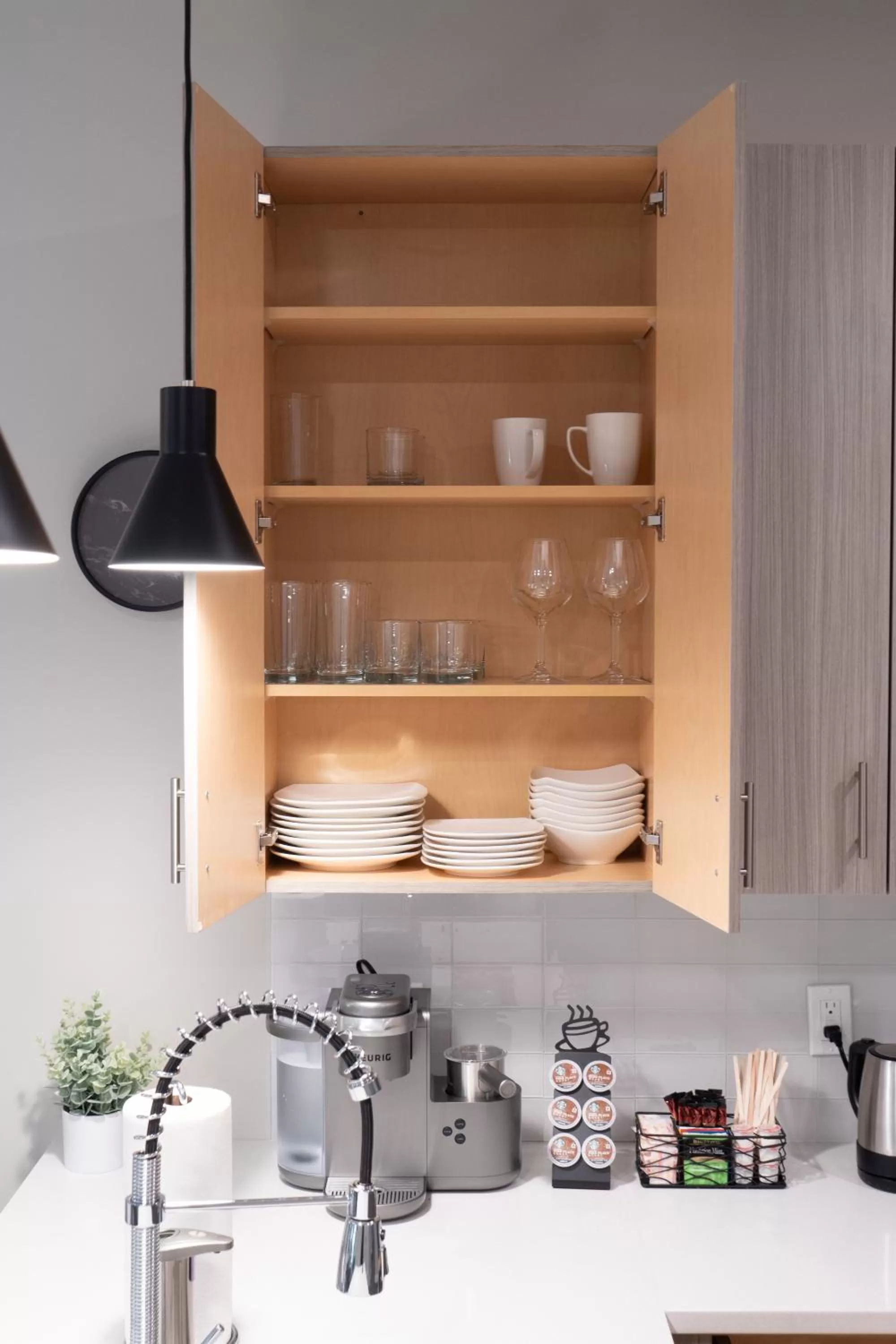 Kitchen or kitchenette in Luxury Furnished Apartments by Hyatus Downtown at Yale