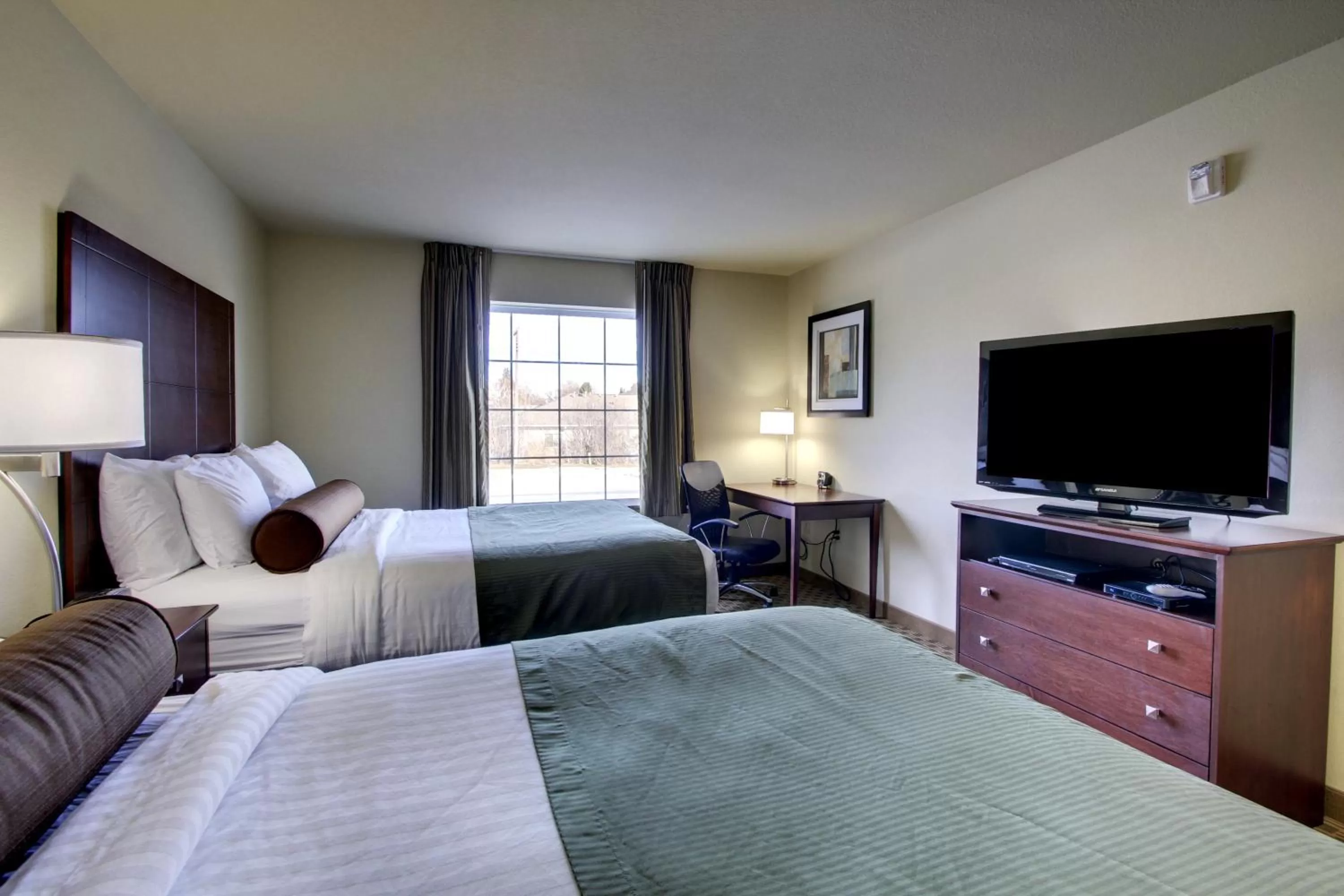 Bed in Cobblestone Inn & Suites - Hartington