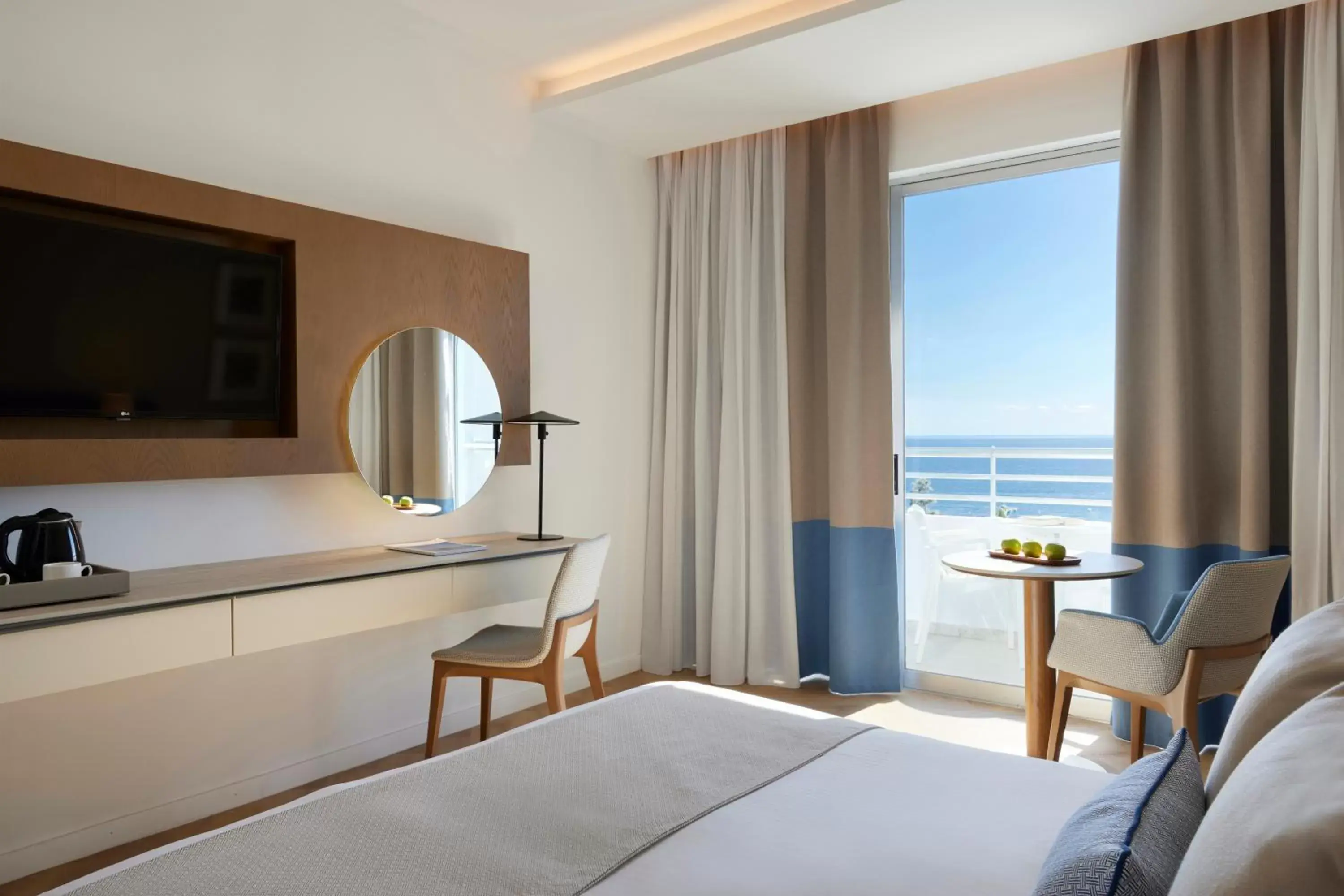 Bedroom, TV/Entertainment Center in Mediterranean Beach Hotel