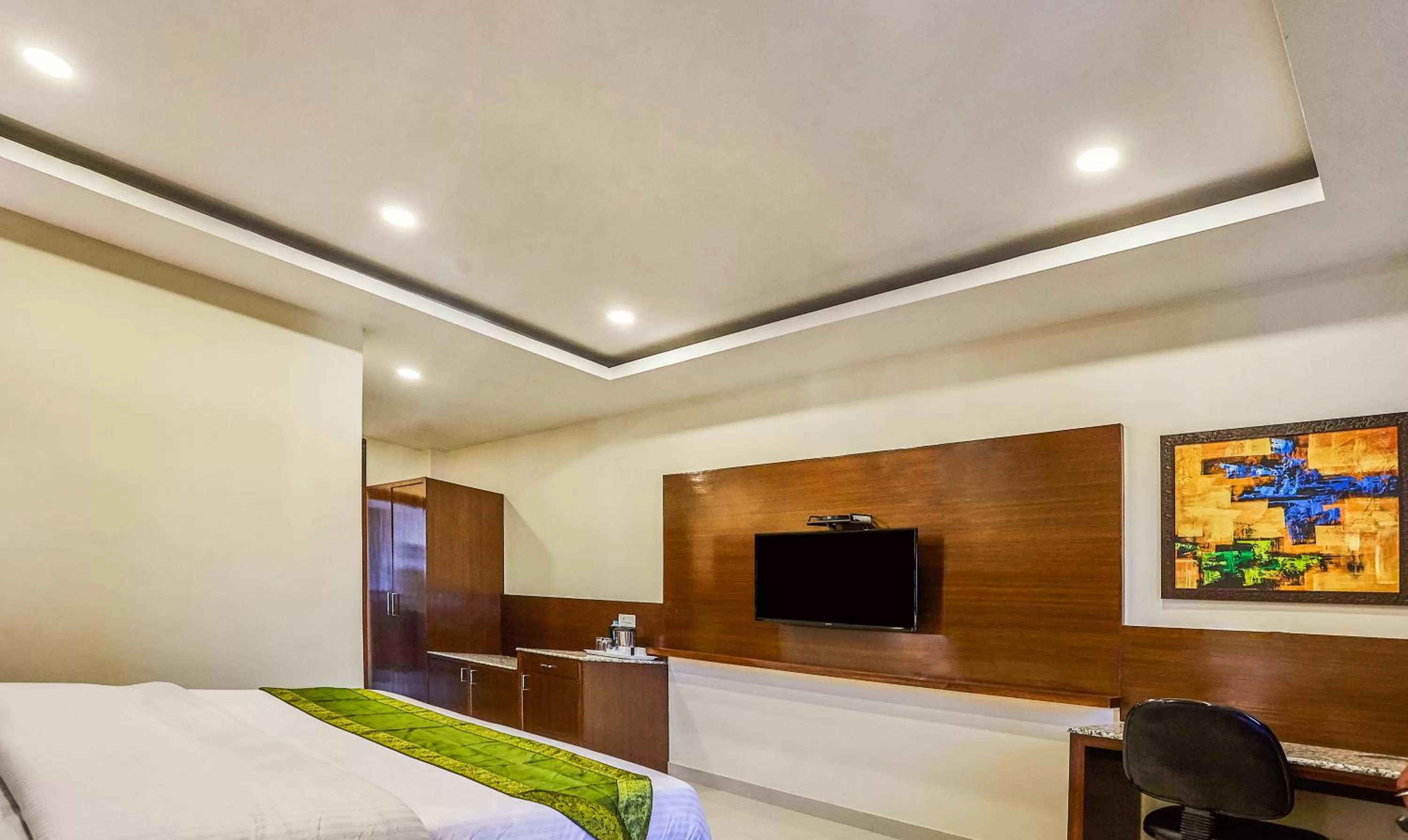 Bedroom, Bed in Treebo Grand Legacy Elite With Roof Top Cafe