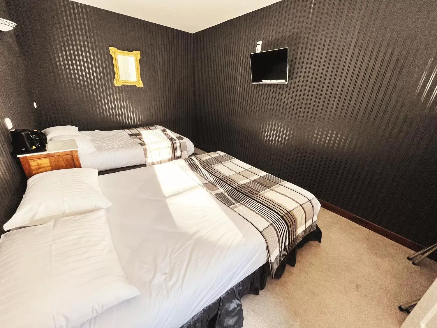 Bed in Hotel De La Poste