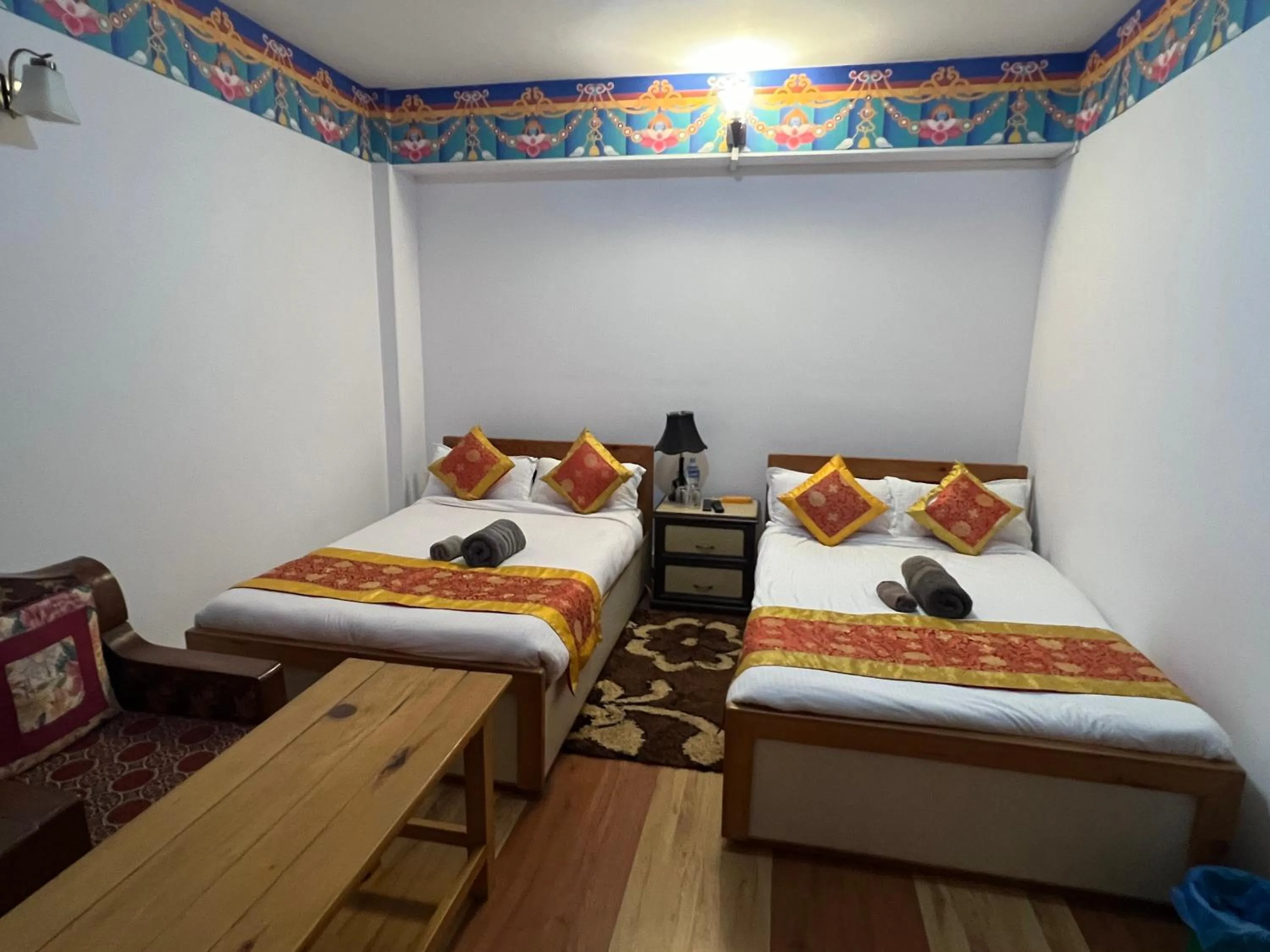 Photo of the whole room, Bed in The Boudha Inn