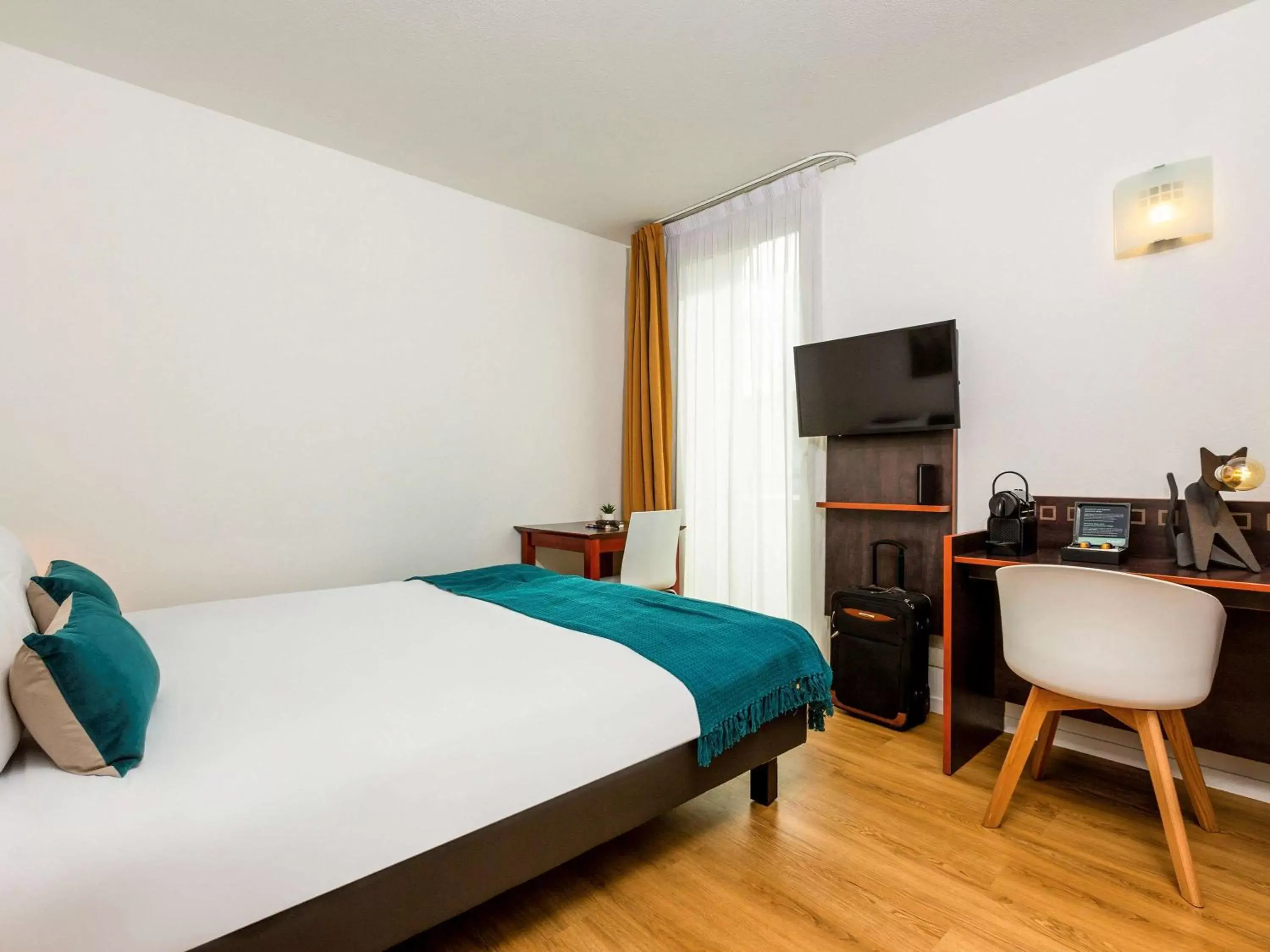 Photo of the whole room, Bed in Aparthotel Adagio Access Paris Porte De Charenton