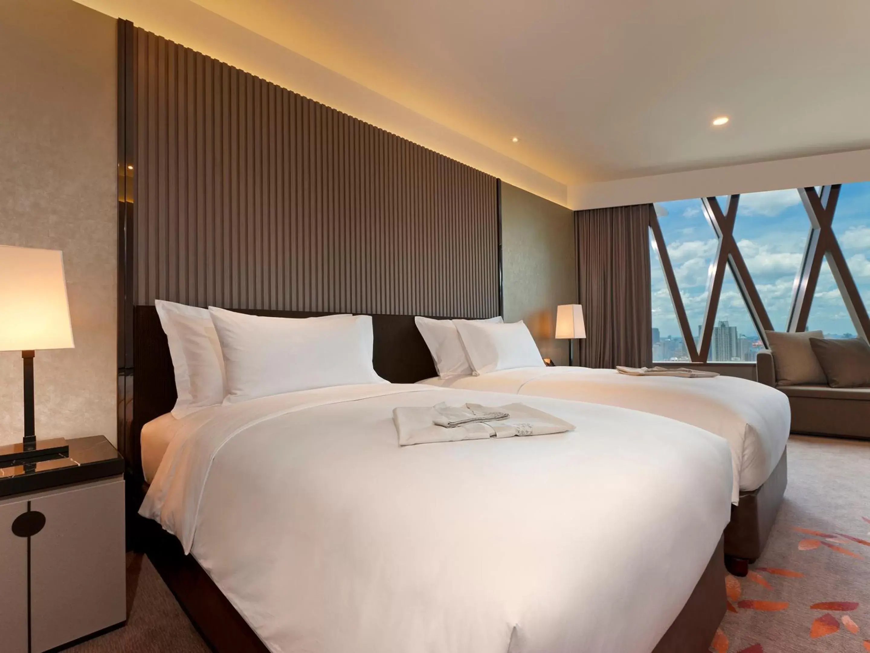 Bed in The Okura Prestige Bangkok