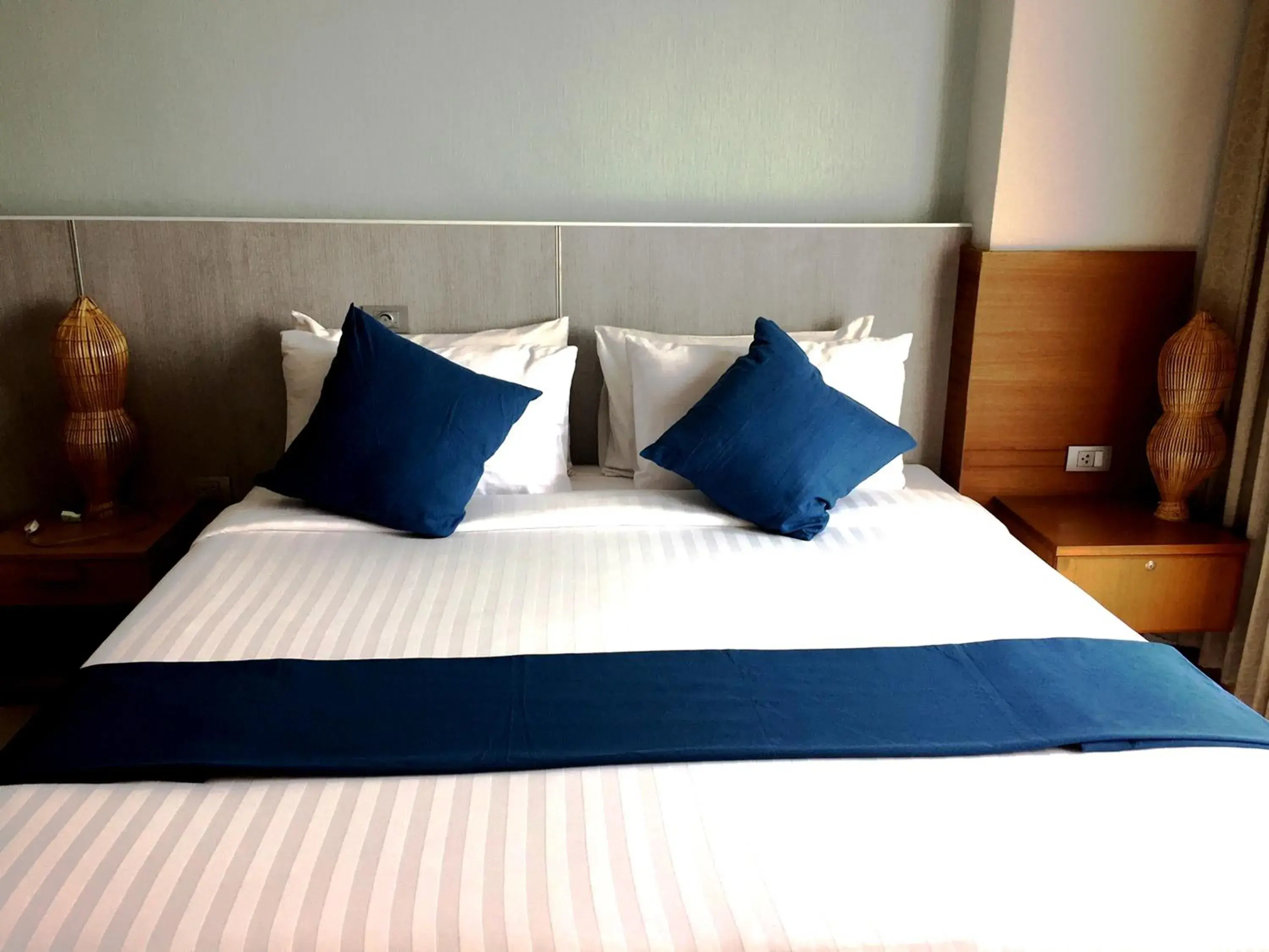 Bed in CRYSTAL JADE  RAYONG HOTEL