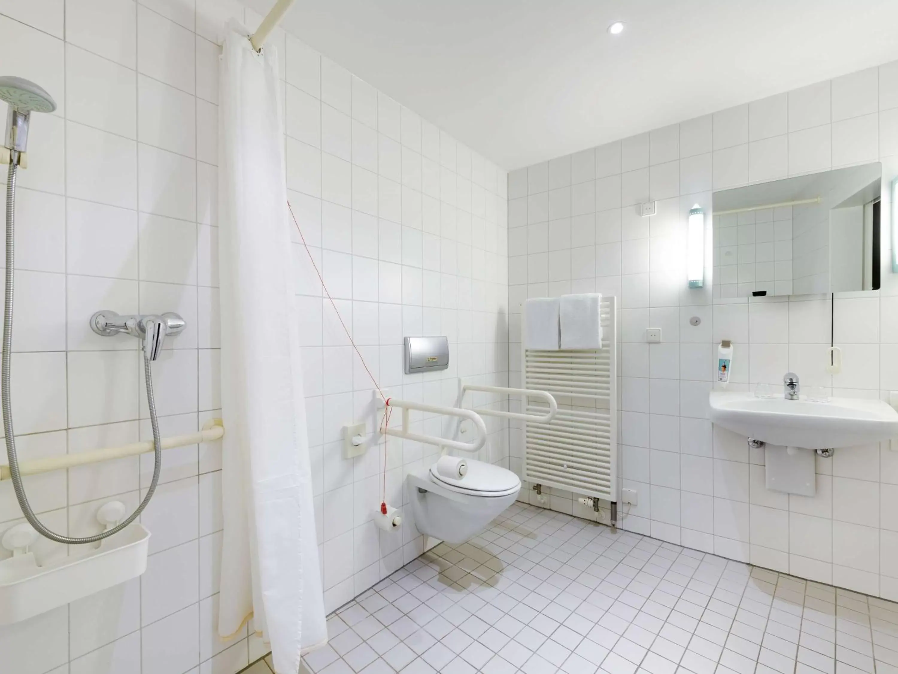 Photo of the whole room, Bathroom in ibis Luebeck City