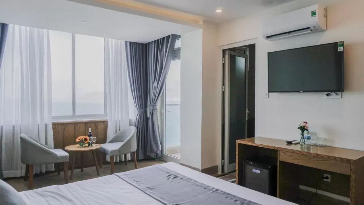 Bedroom, TV/Entertainment Center in Glory Nha Trang Hotel