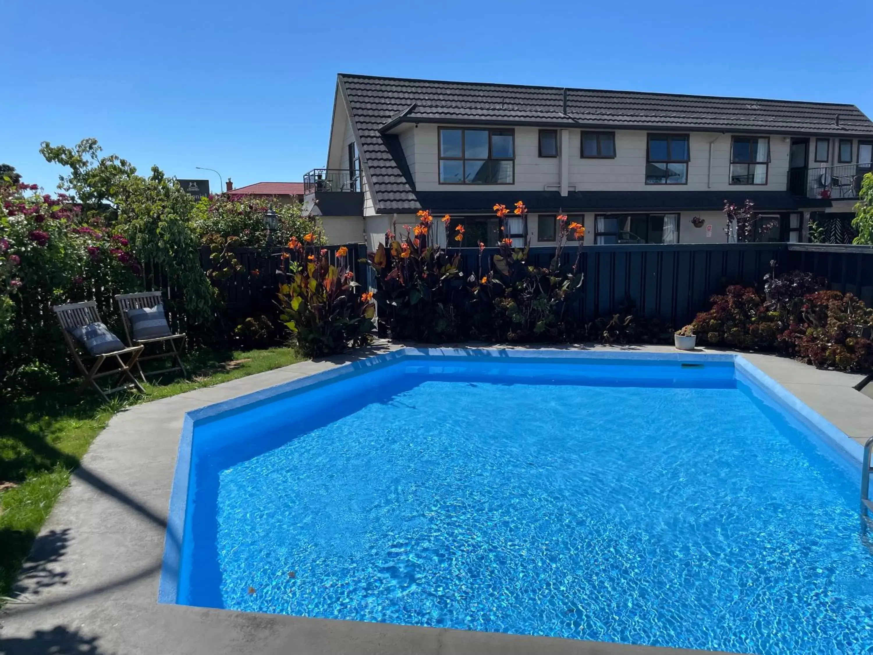 Swimming pool, Property Building in Colonial Motel