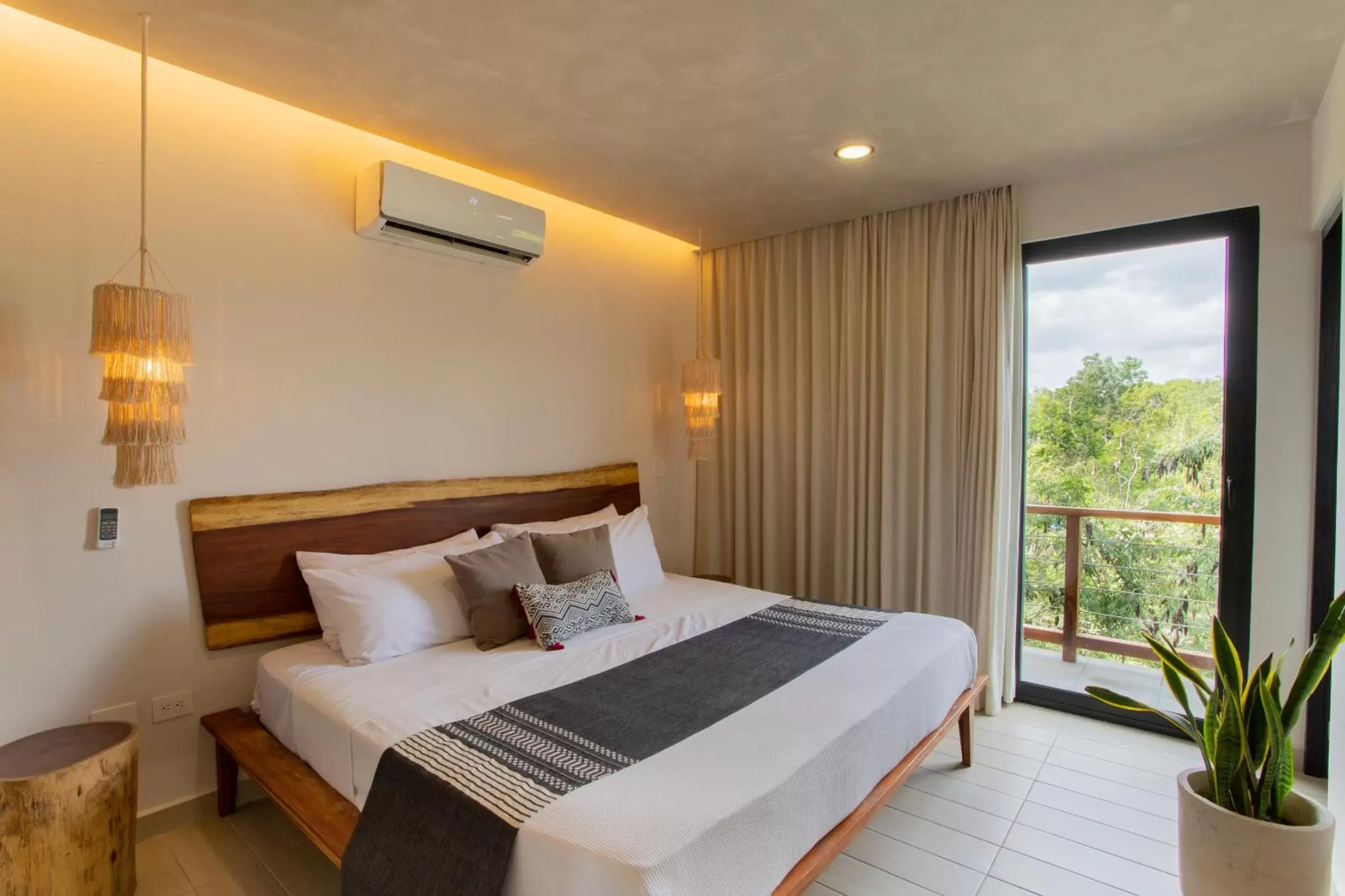 Photo of the whole room, Bed in Luxury Condos Macondo Tulum