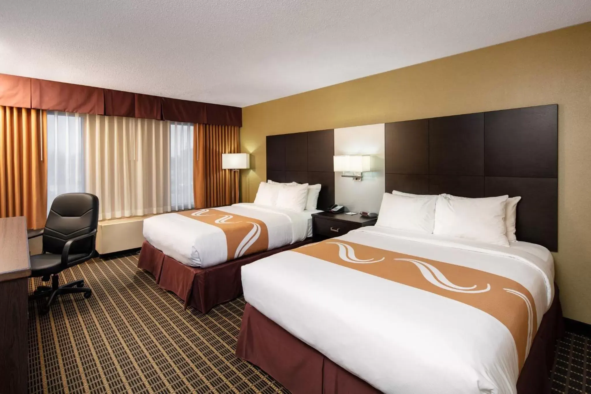 Photo of the whole room, Bed in Quality Inn & Suites Downtown Windsor, ON, Canada