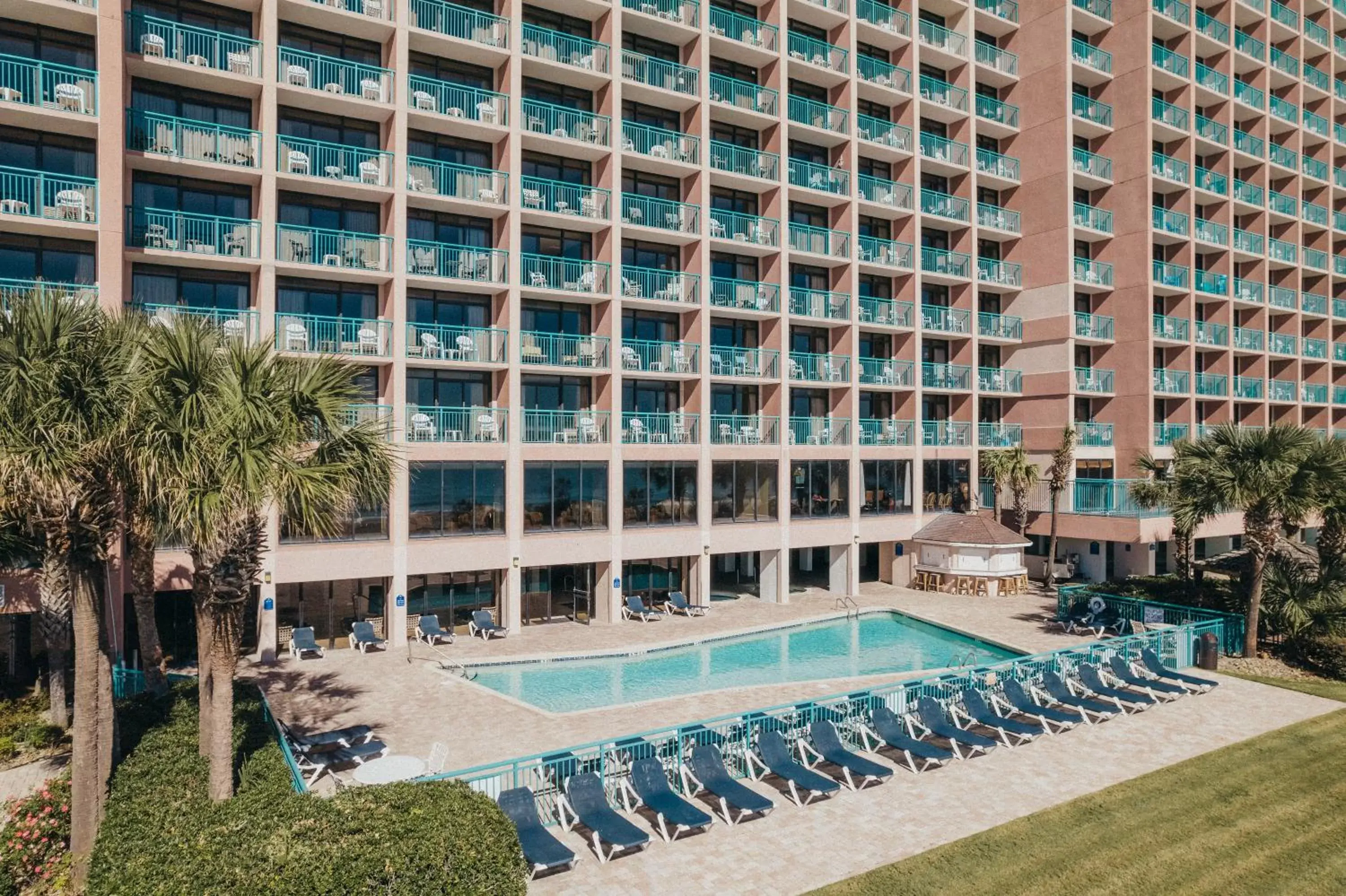 Property building, Pool View in Sandcastle Oceanfront Resort South Beach Property building, Pool View in Sandcastle Oceanfront Resort South Beach
