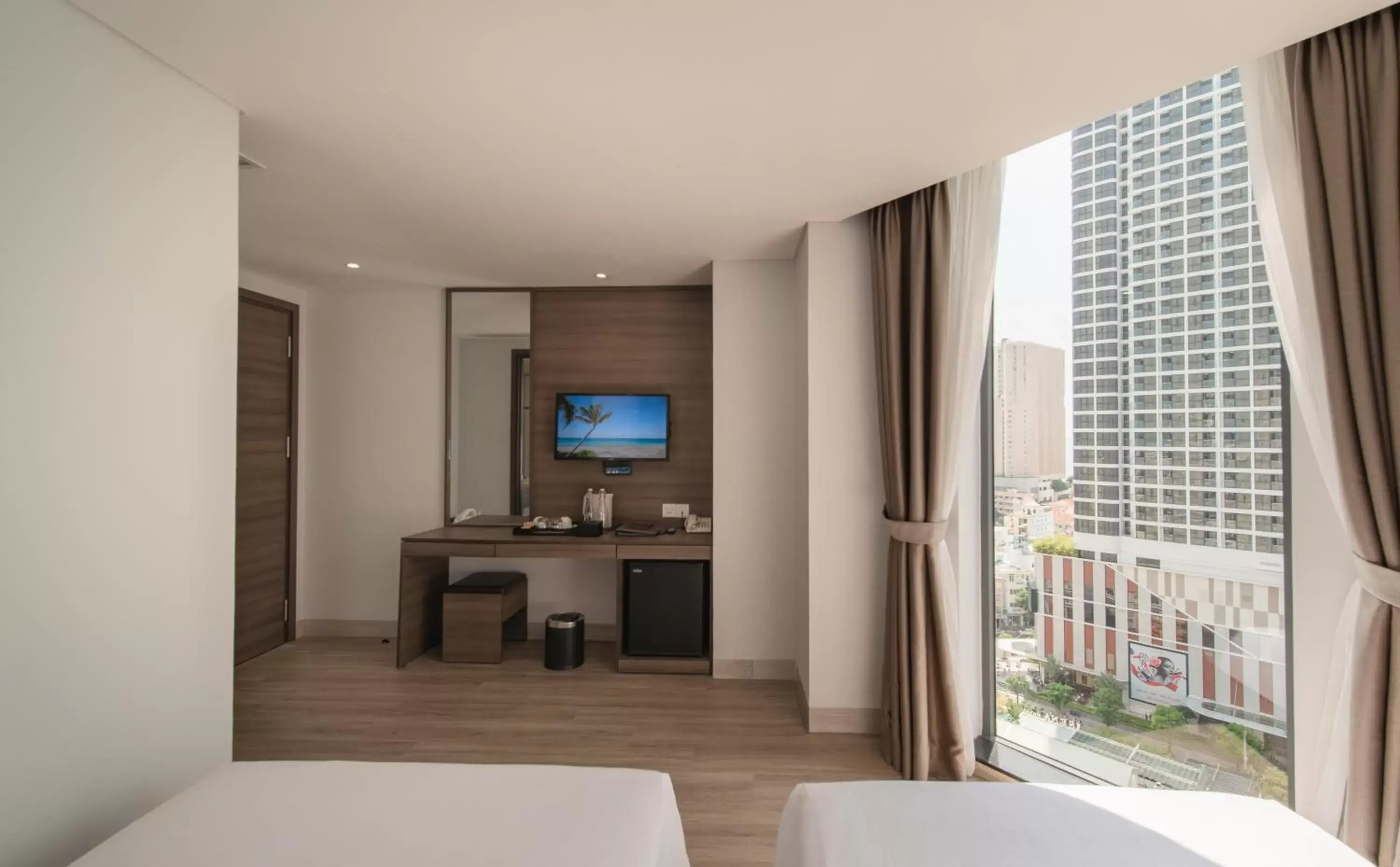 TV and multimedia, TV/Entertainment Center in Zenia Boutique Hotel Nha Trang