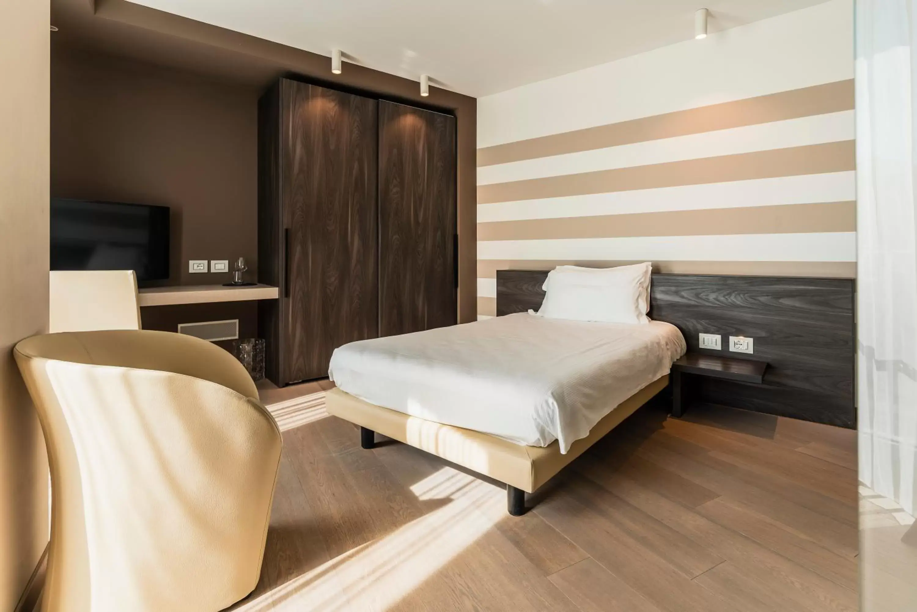 Bed in Suites Hotel Astor