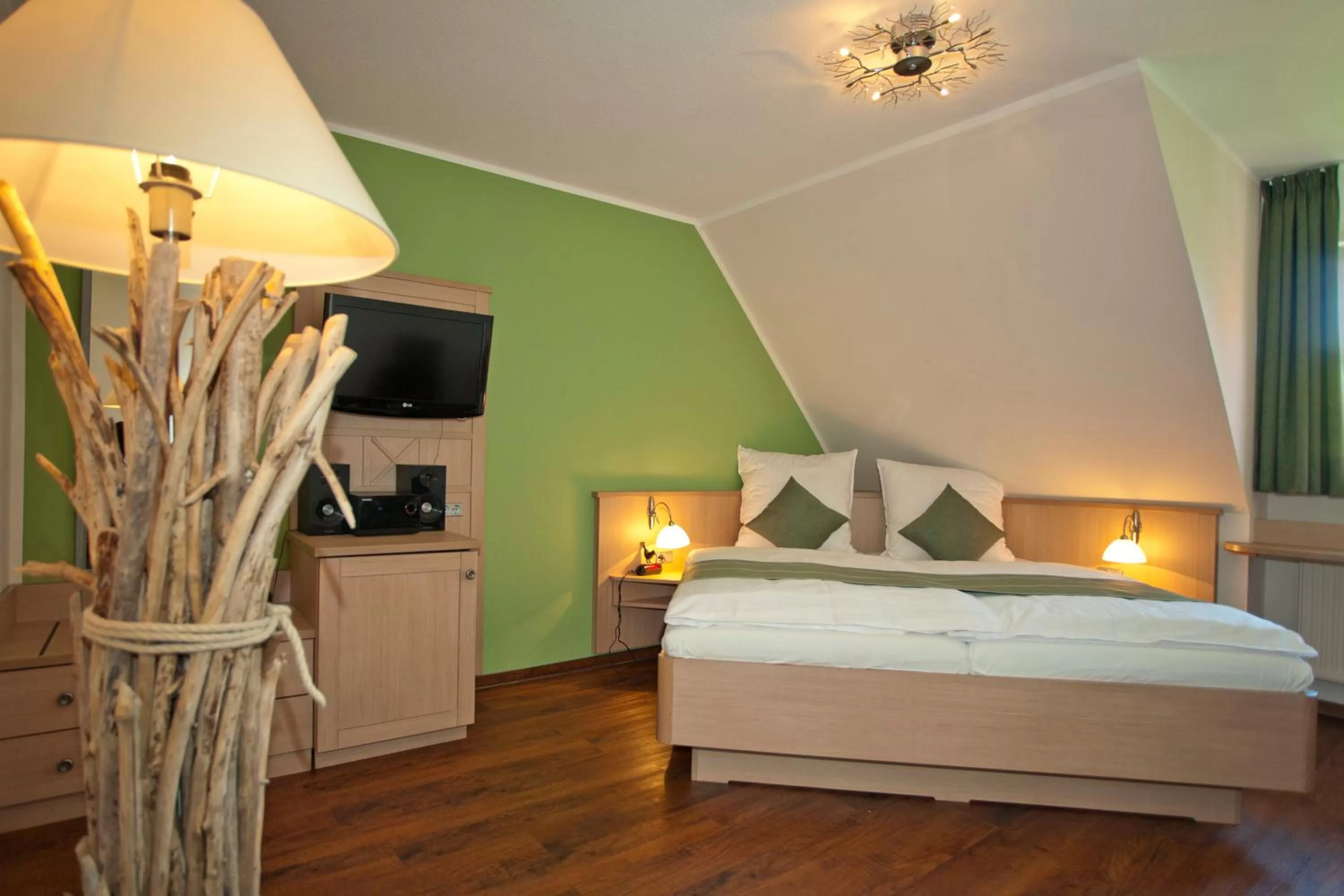 Photo of the whole room, Bed in Kathmeyers Landhaus Godewind