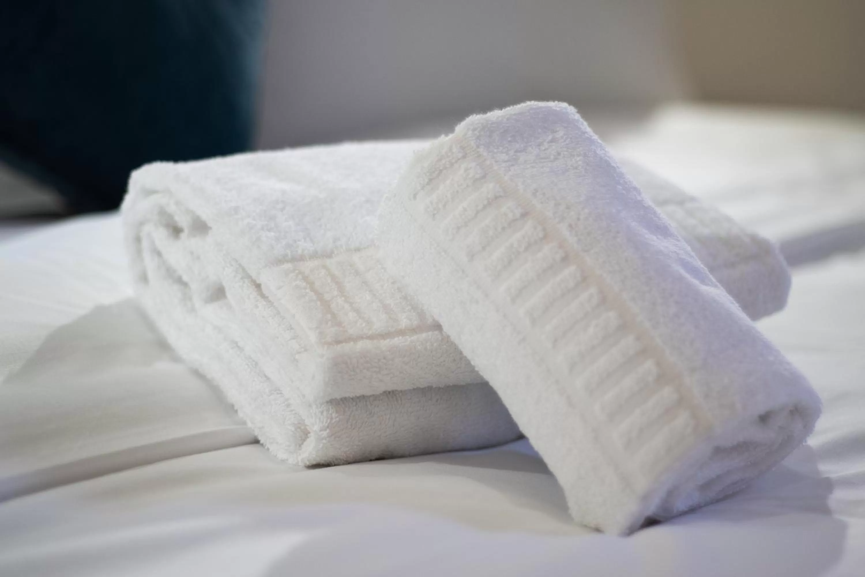 towels, Bed in Karam City Hotel