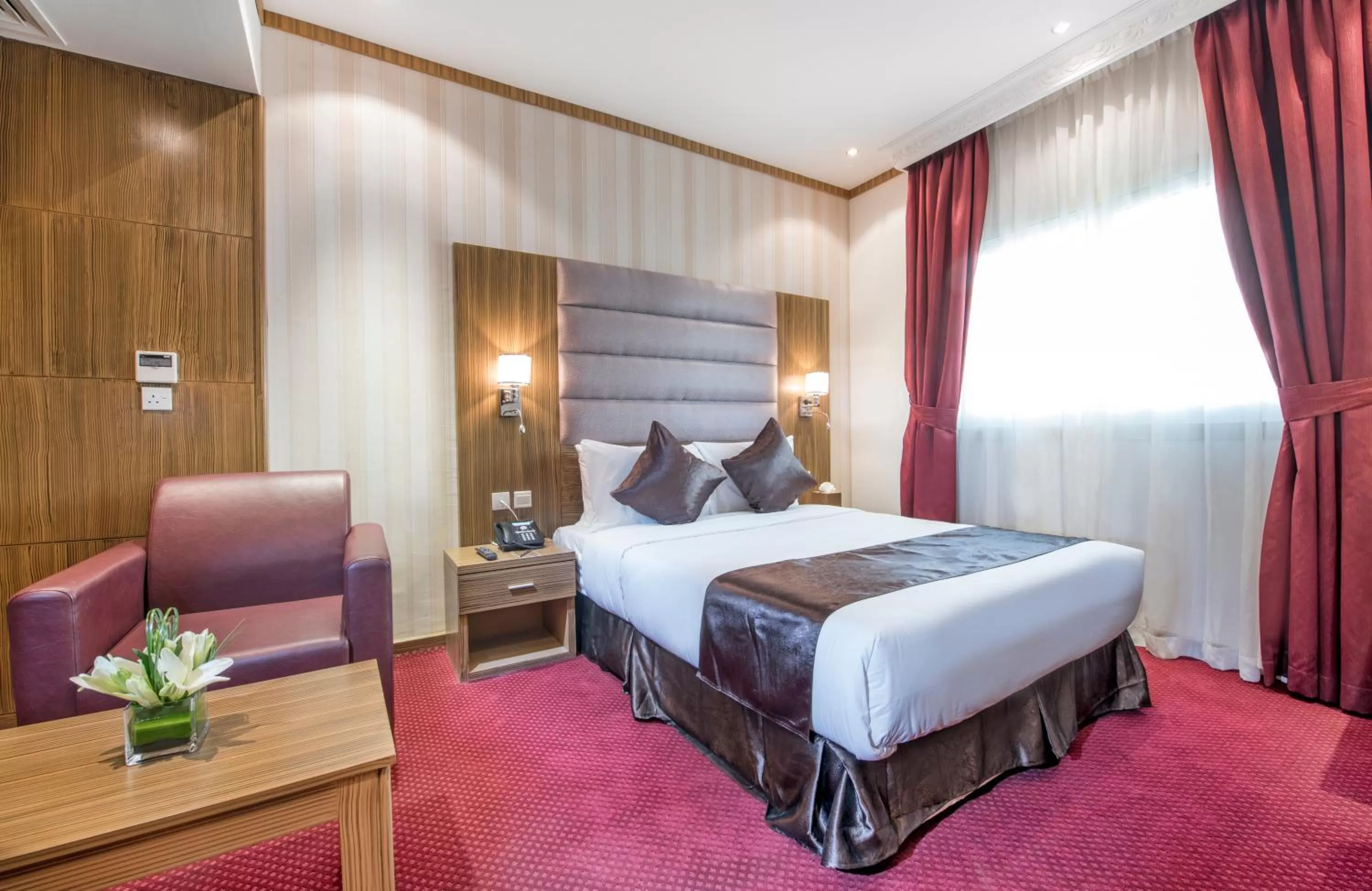 Bed in Royal Tulip Hotel LLC