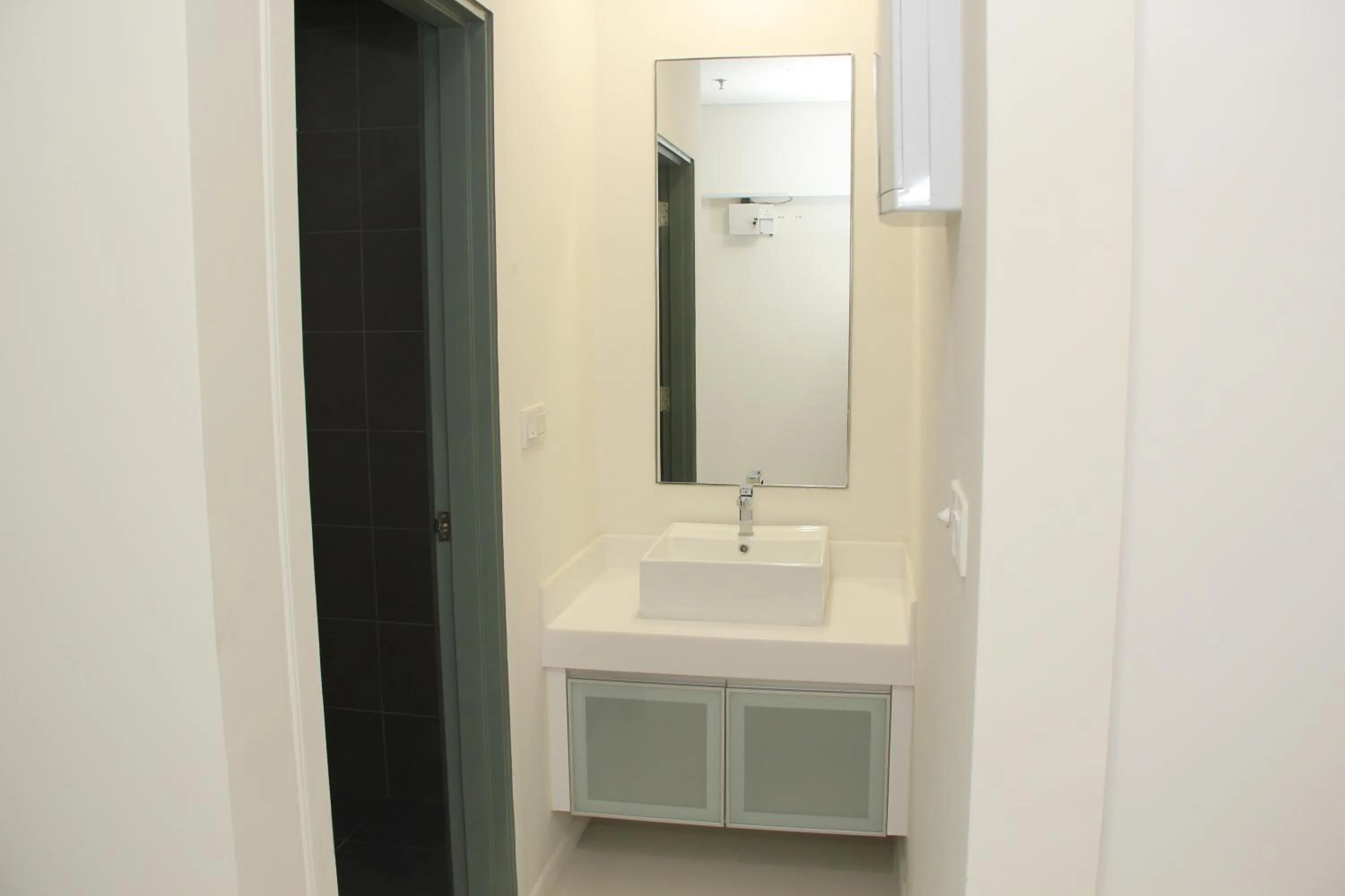 Bathroom in Summer Suites Residences by Subhome