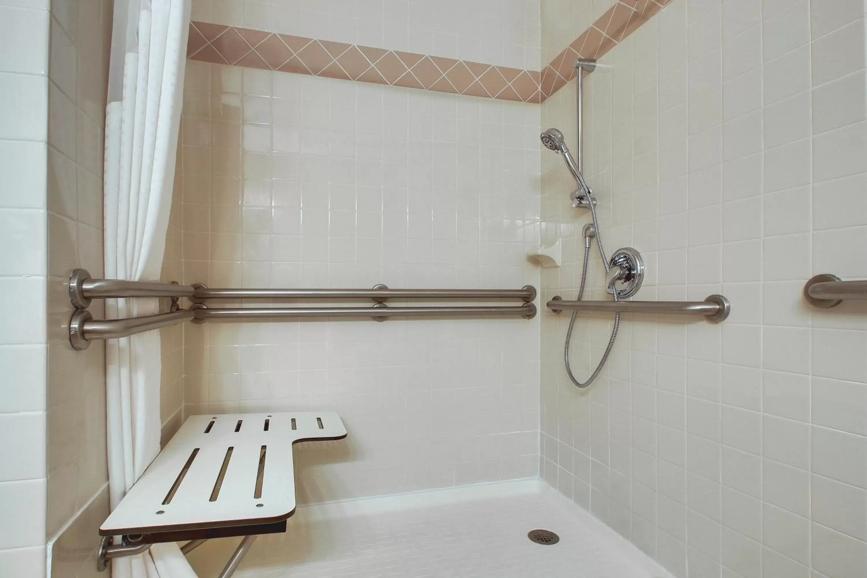 Photo of the whole room, Bathroom in Holiday Inn Westbury-Long Island, an IHG Hotel