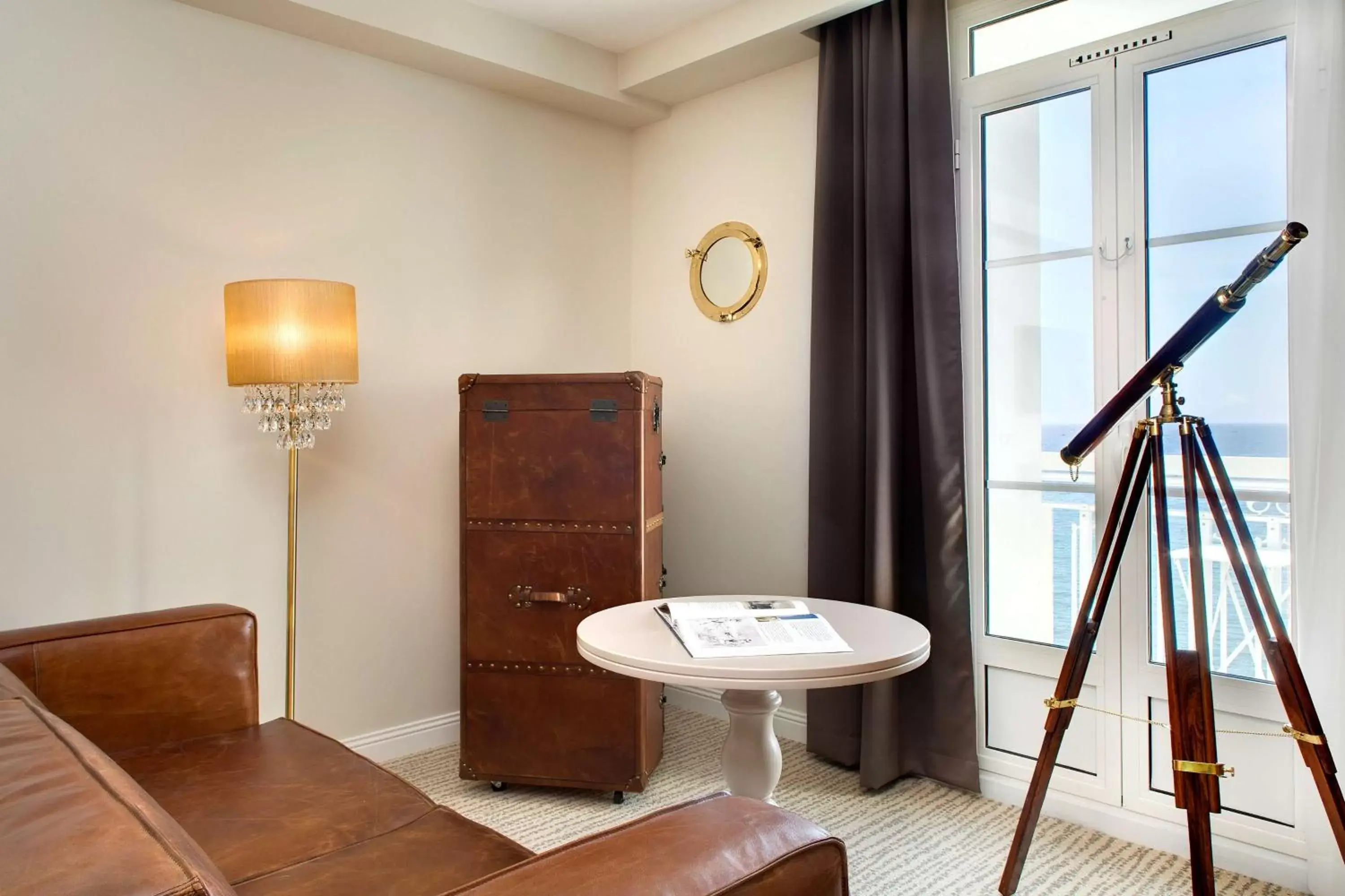 Living room in Grand Hotel Des Sablettes Plage, Curio Collection By Hilton