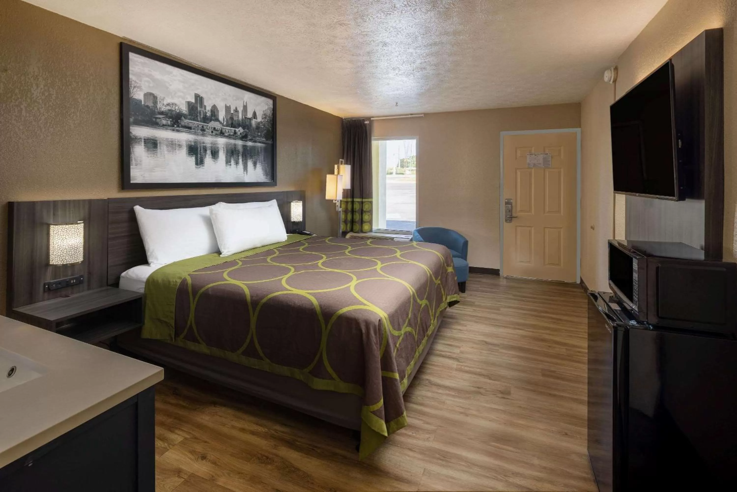 Photo of the whole room, Bed in Super 8 by Wyndham McDonough GA