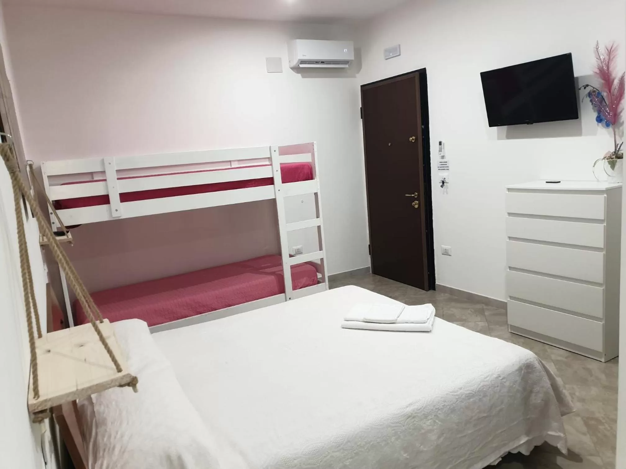 Family Room with Garden View in B&B IL MENHIR