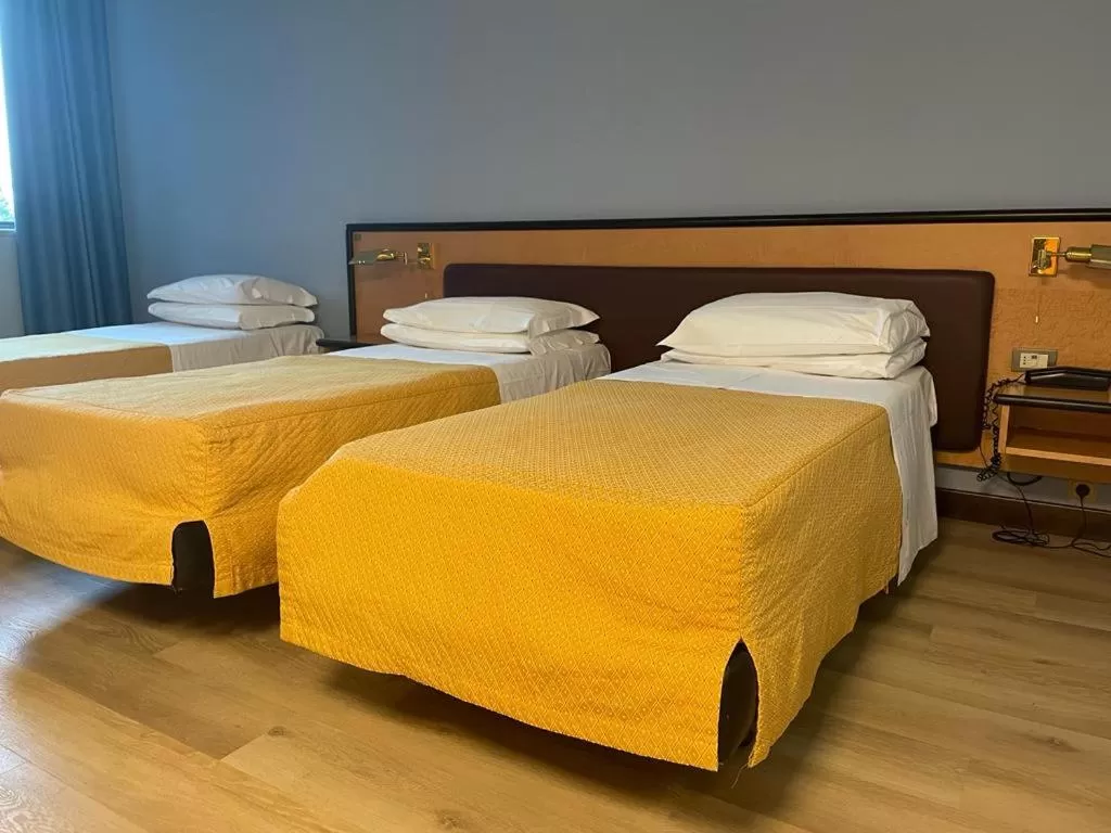 Bed in Art & Hotel Treviolo