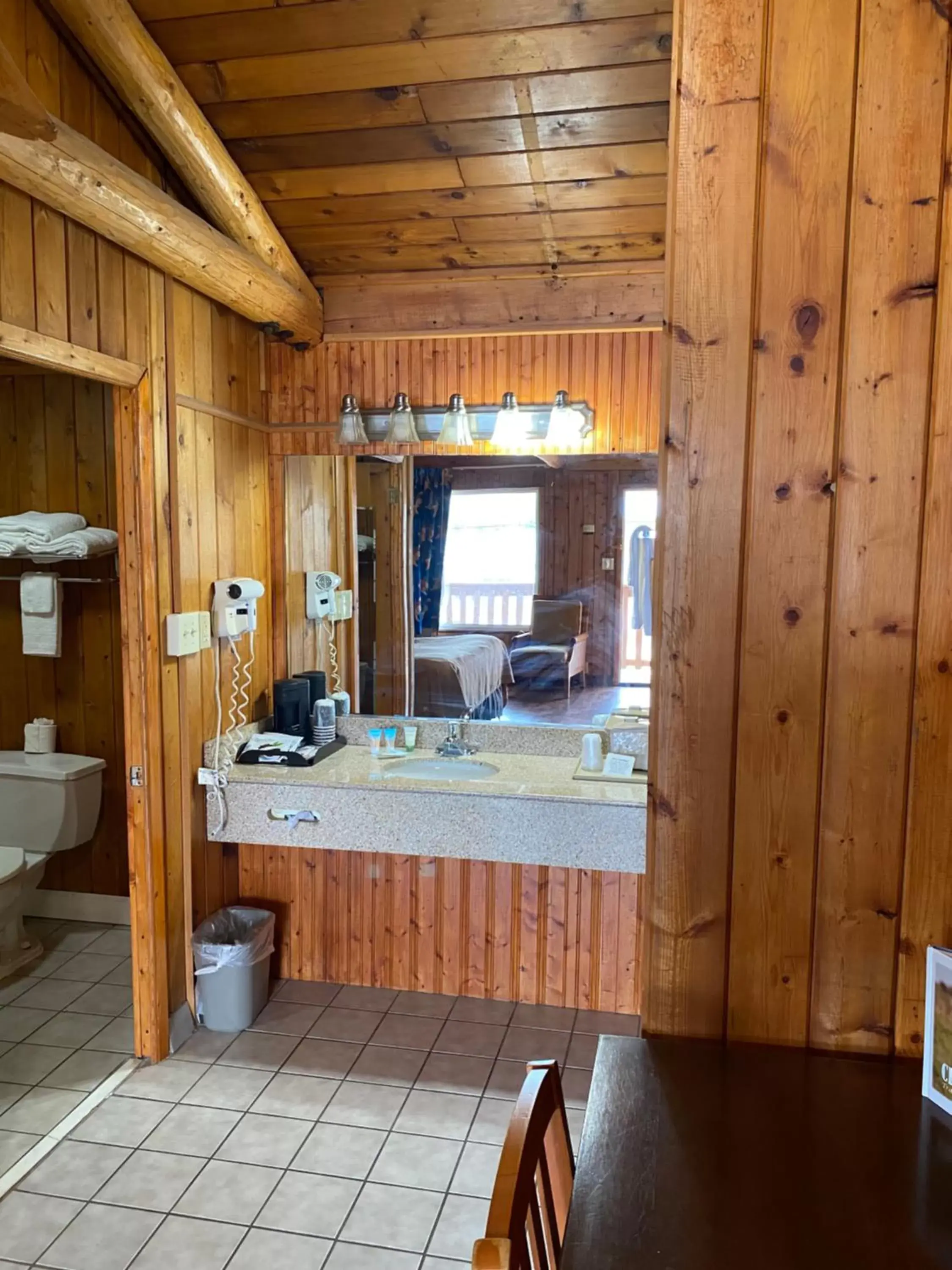 Toilet, Kitchen/Kitchenette in Atlantic Shores Inn and Suites