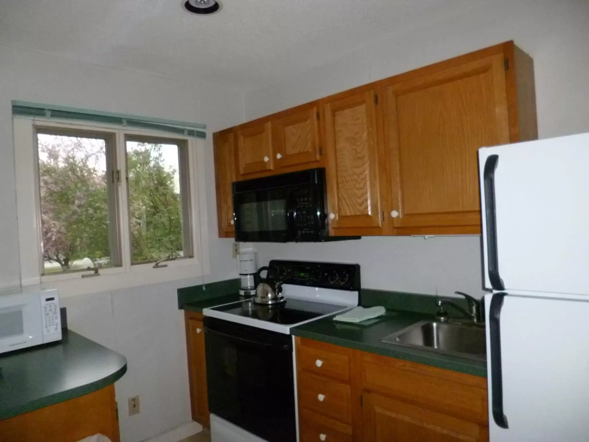 Kitchen or kitchenette, Kitchen/Kitchenette in Stowe Motel & Snowdrift