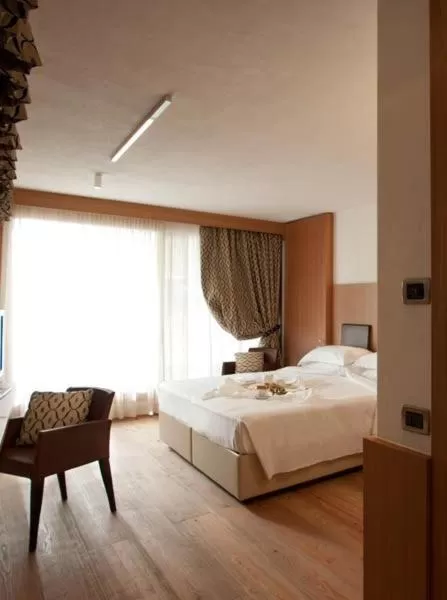 Bed in Hotel Alaska Cortina