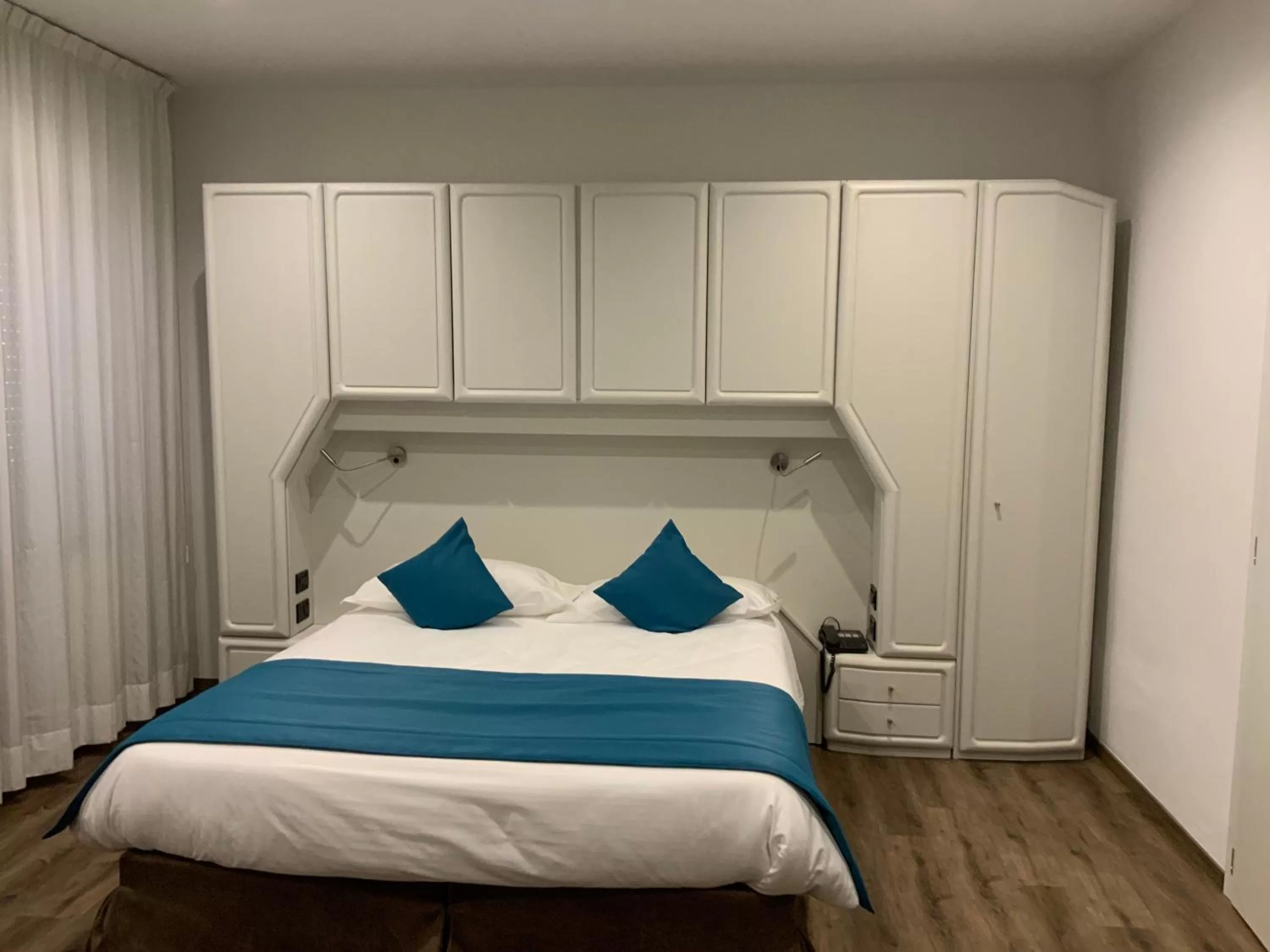 Bed in Albergo Cappello e Cadore