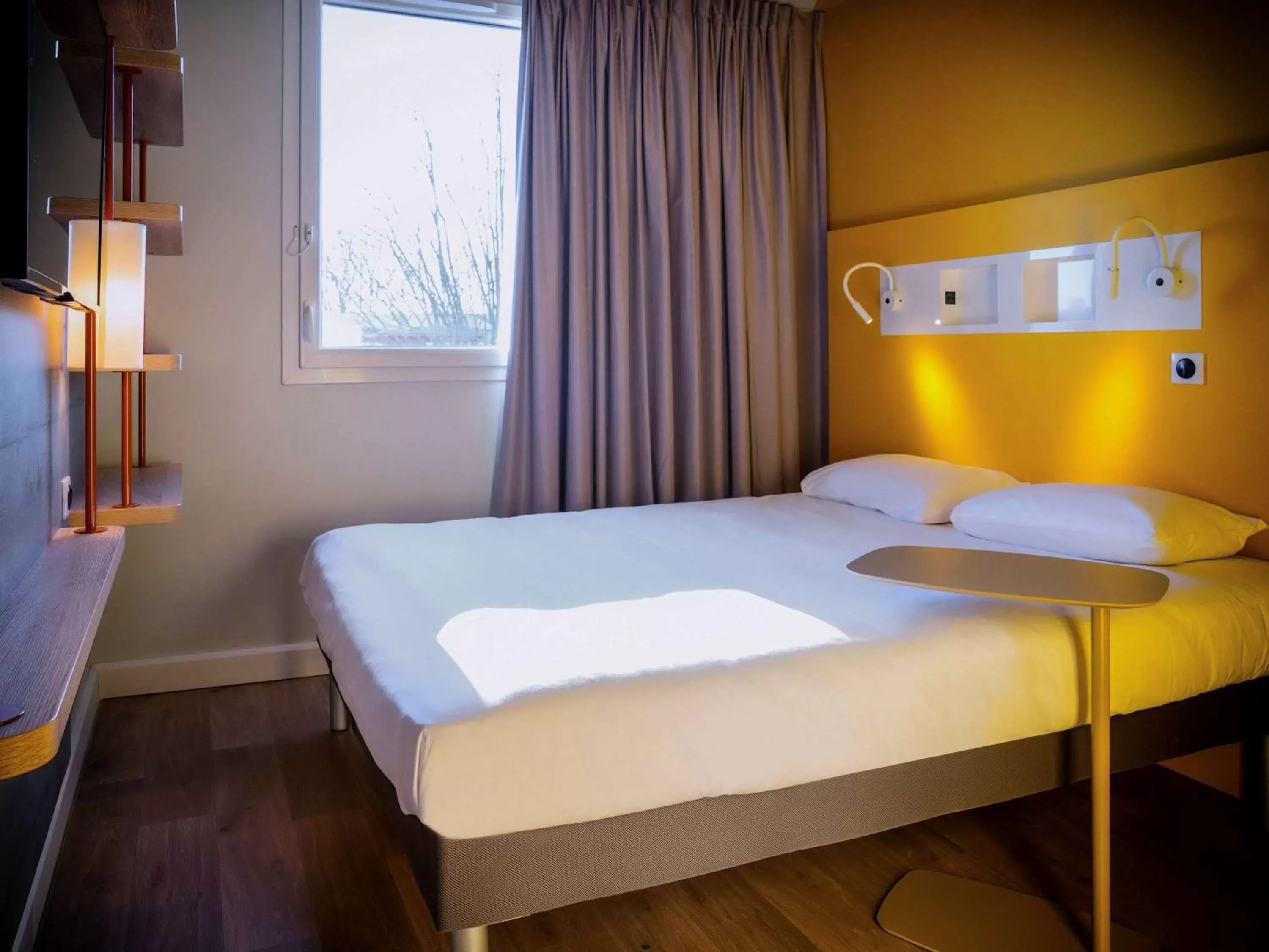 Photo of the whole room, Bed in ibis budget Reims Parc Des Expositions