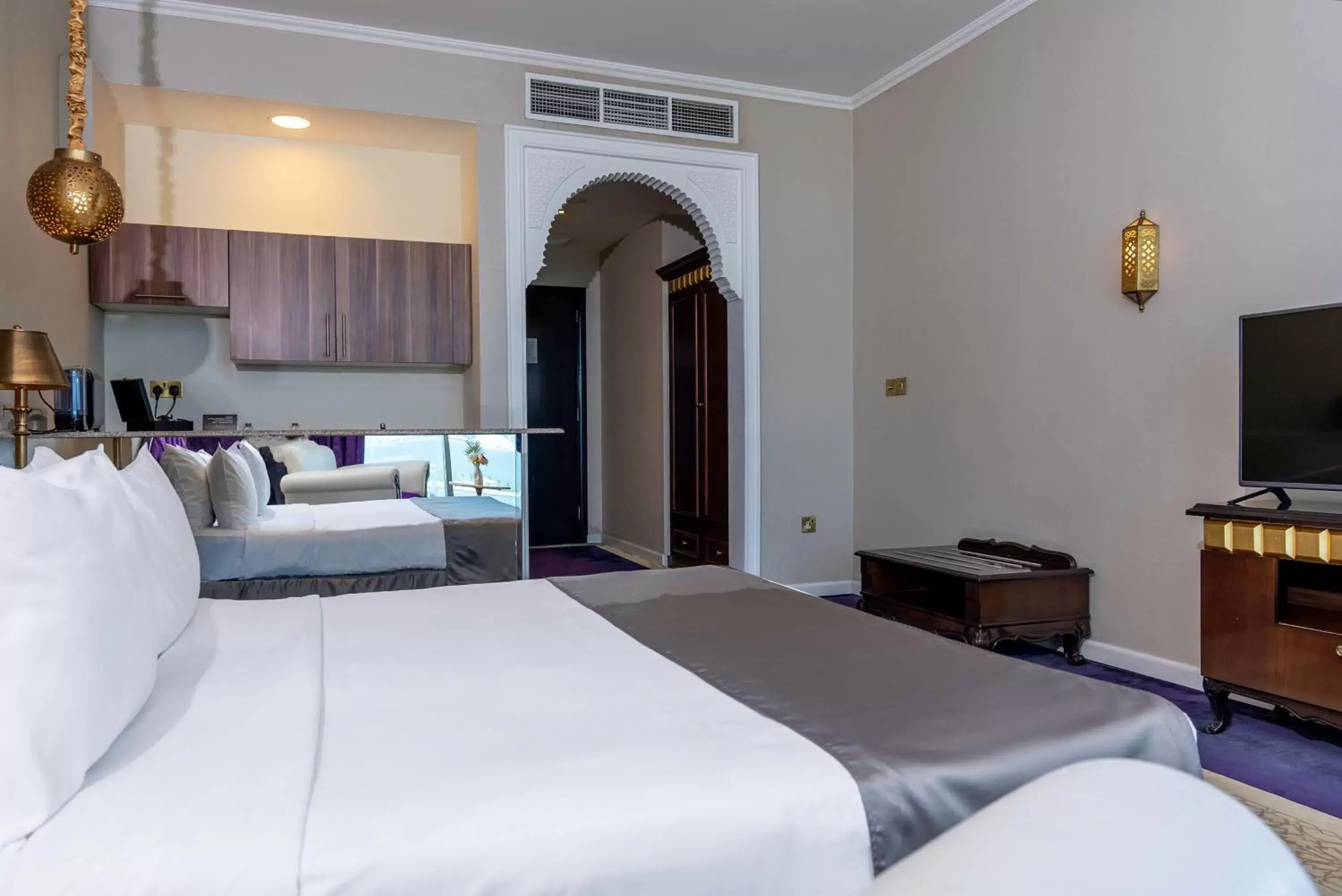 Bed in Saraya Corniche Hotel