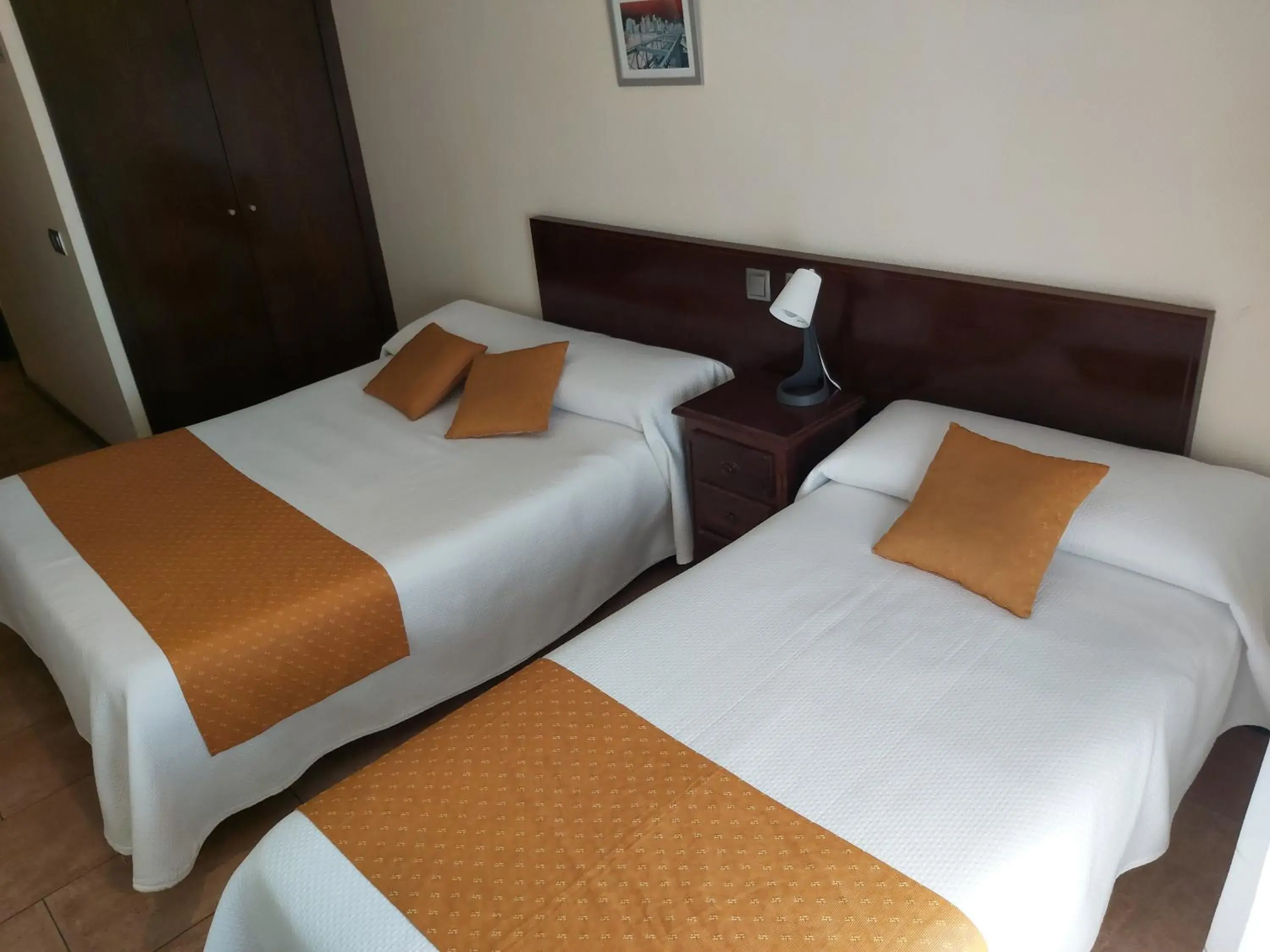 Bed in Hotel Complutense