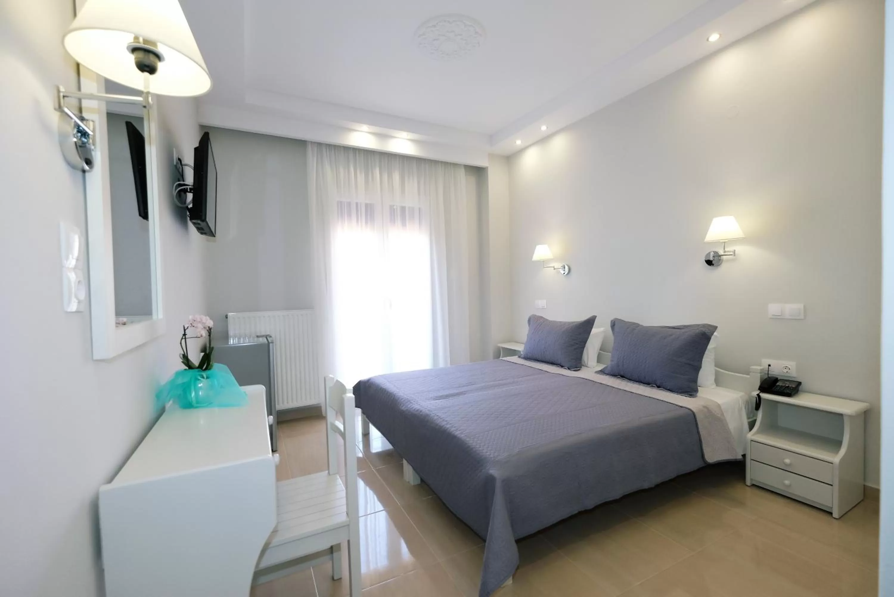 Photo of the whole room, Bed in Limnia Gi