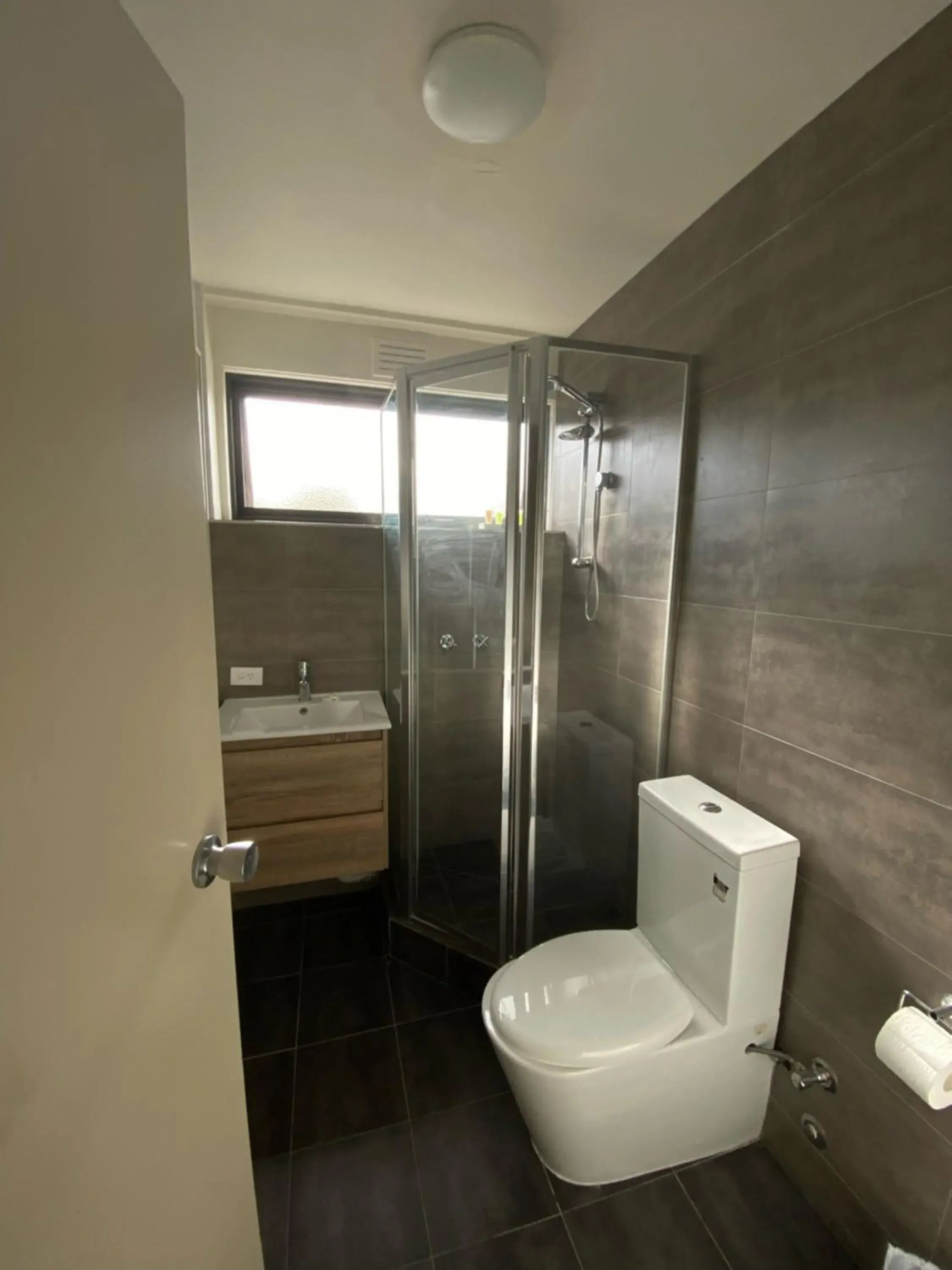 Bathroom in City Edge East Melbourne Apartment Hotel