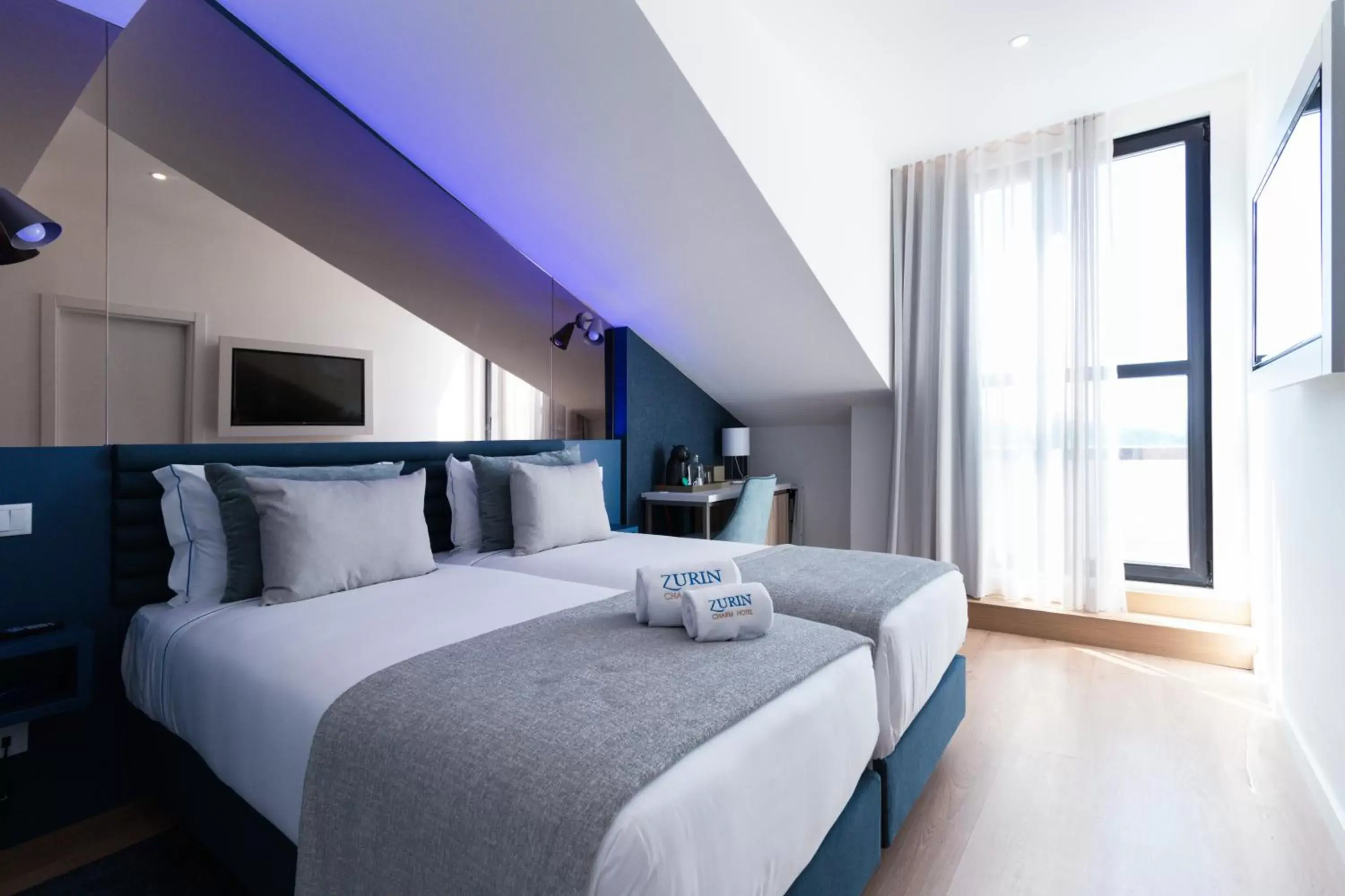 Bed in Zurin Charm Hotel