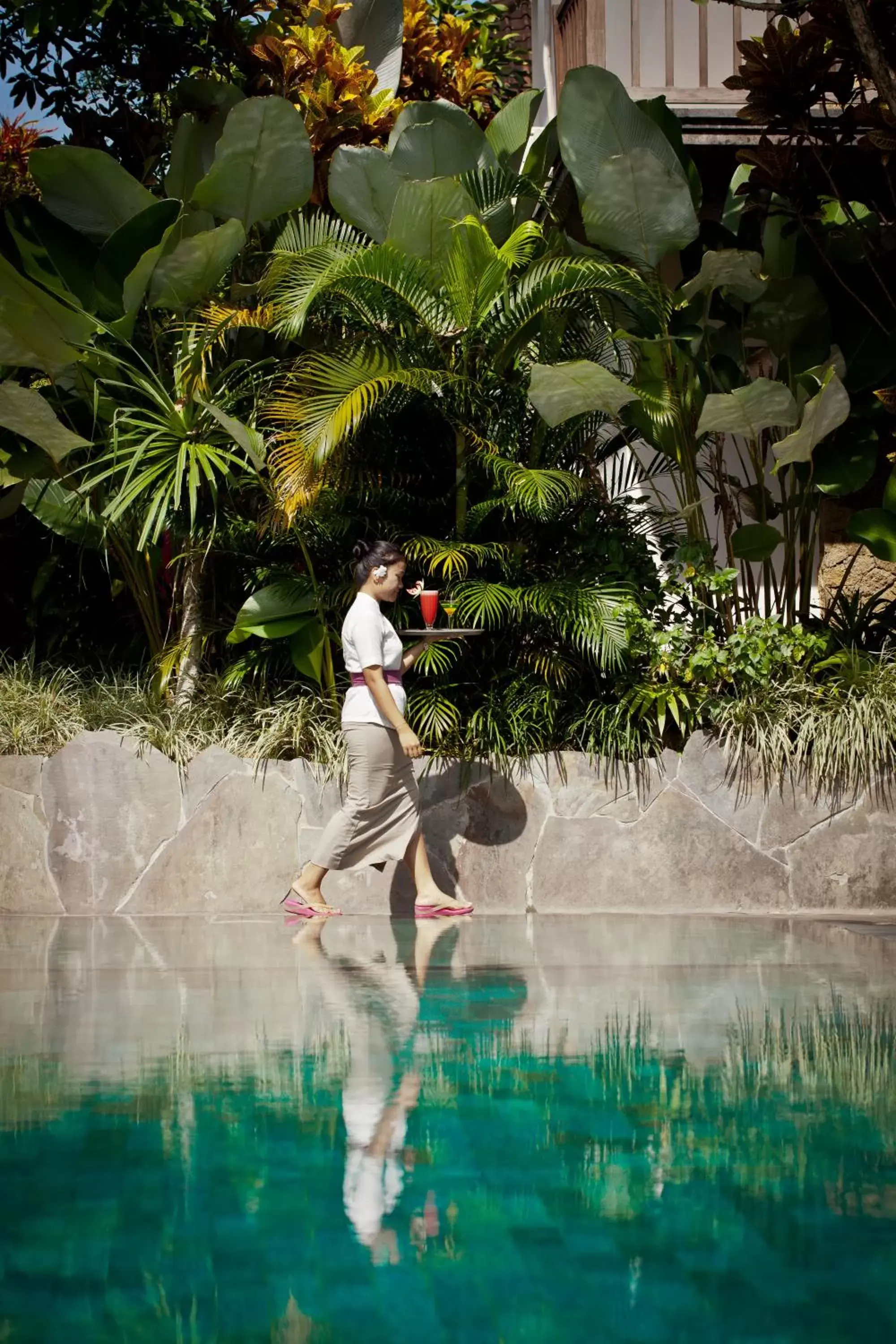 Staff, Swimming Pool in Sri Ratih Cottages, CHSE Certified