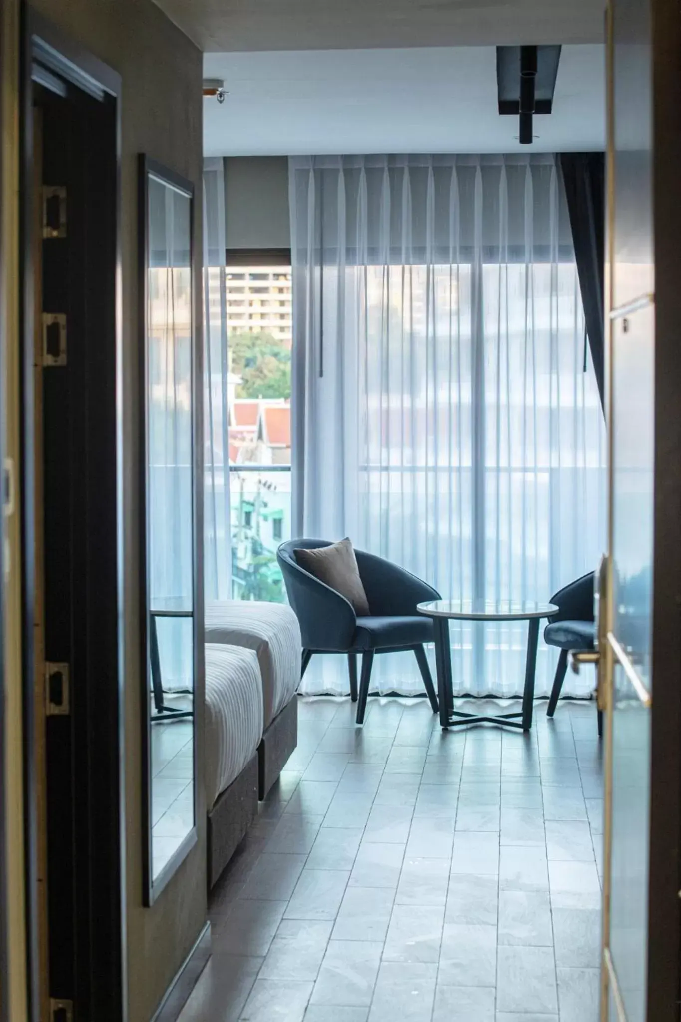 Seating area in Lewit Hotel Pattaya, a member of Radisson Individuals