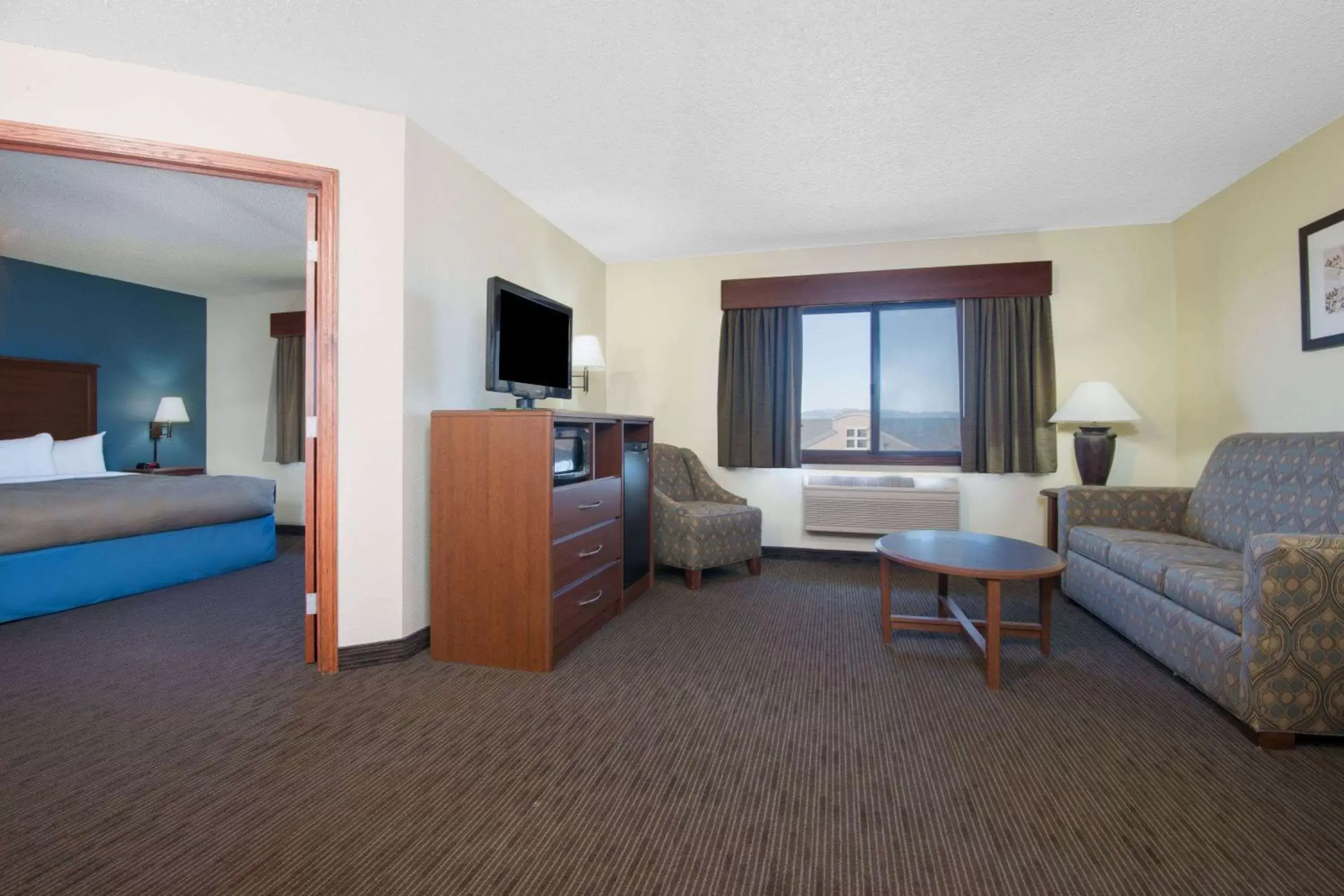 Bed in AmericInn by Wyndham Windsor Ft. Collins Bed in AmericInn by Wyndham Windsor Ft. Collins