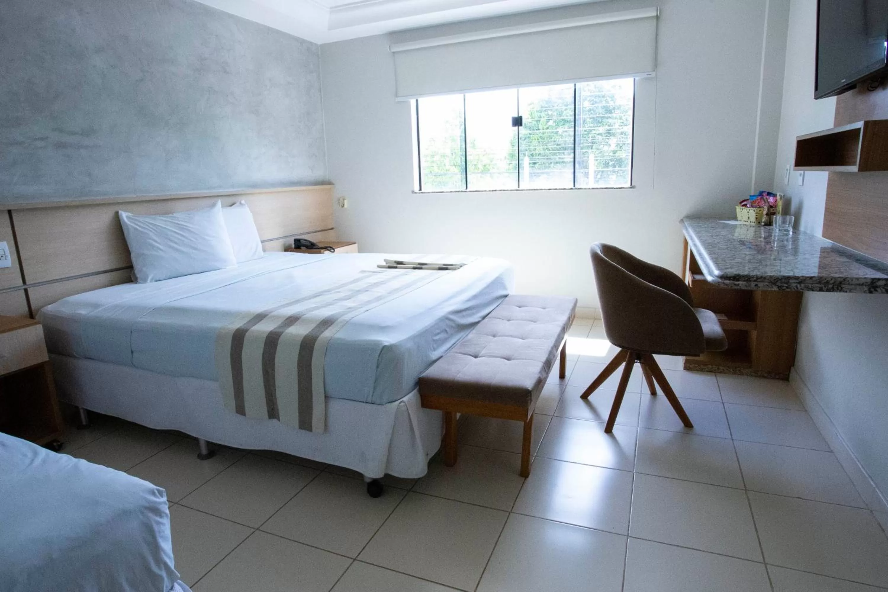 Bed in Atrium Confort Hotels