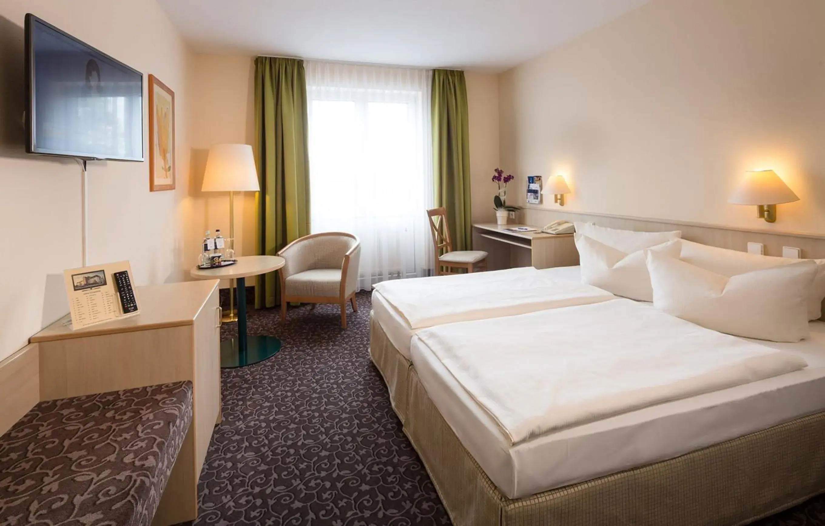 Photo of the whole room, Bed in AMBER HOTEL Chemnitz Park