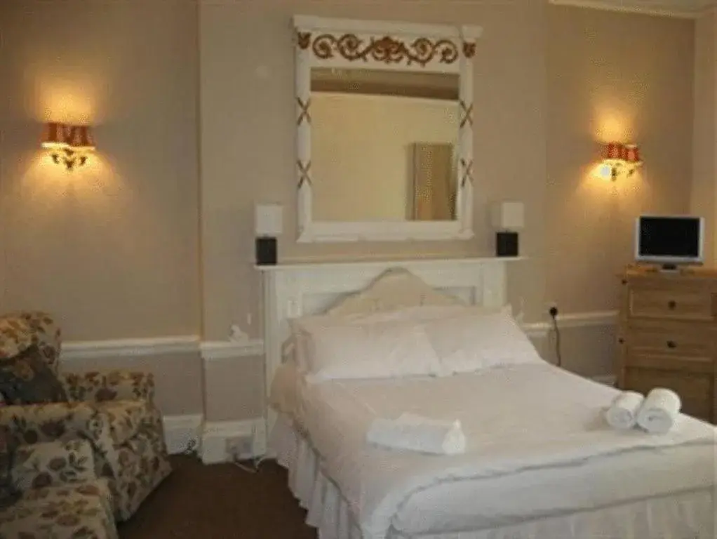 Bed in The Queensbury Hotel