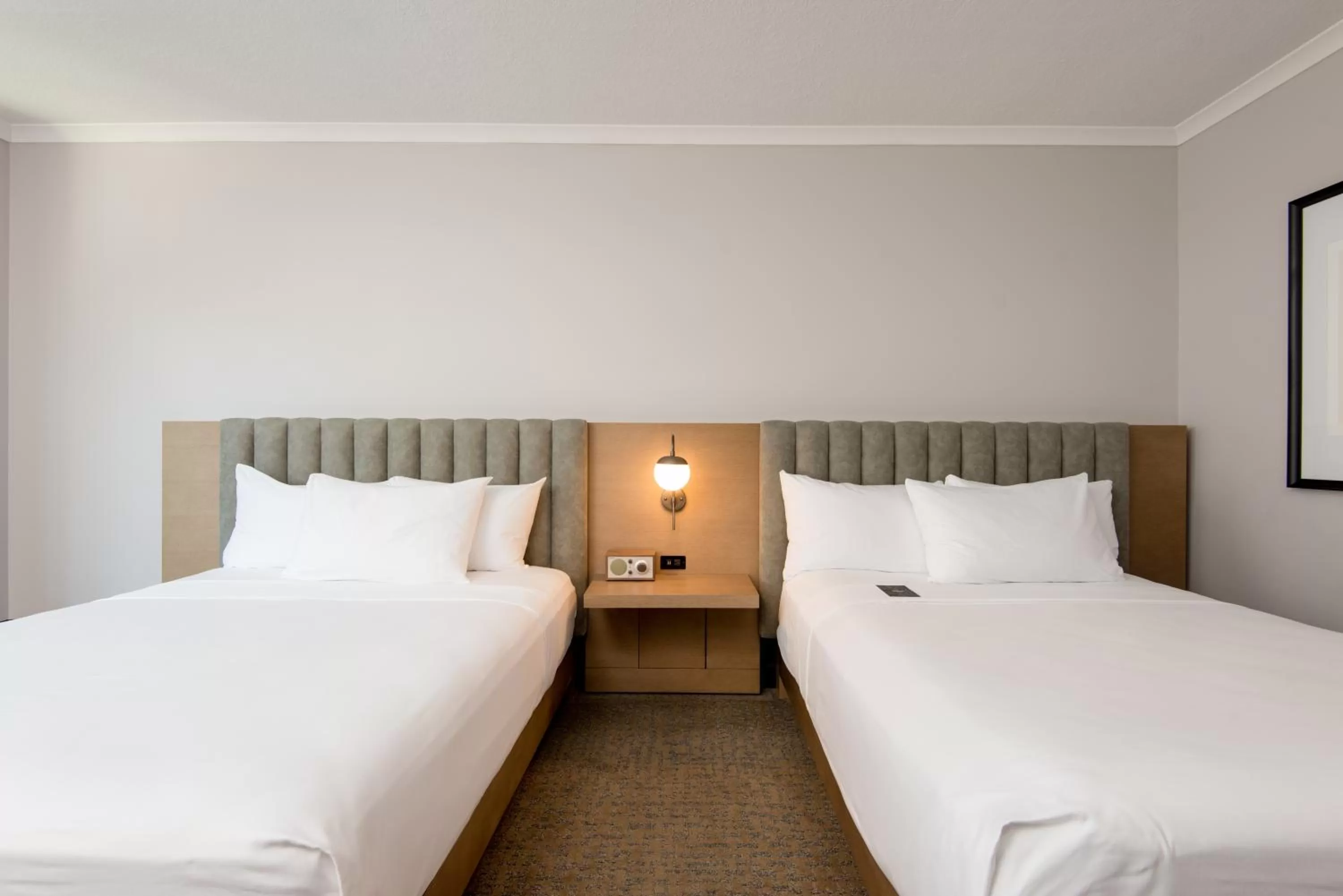 Bed in The Duniway Portland, A Hilton Hotel