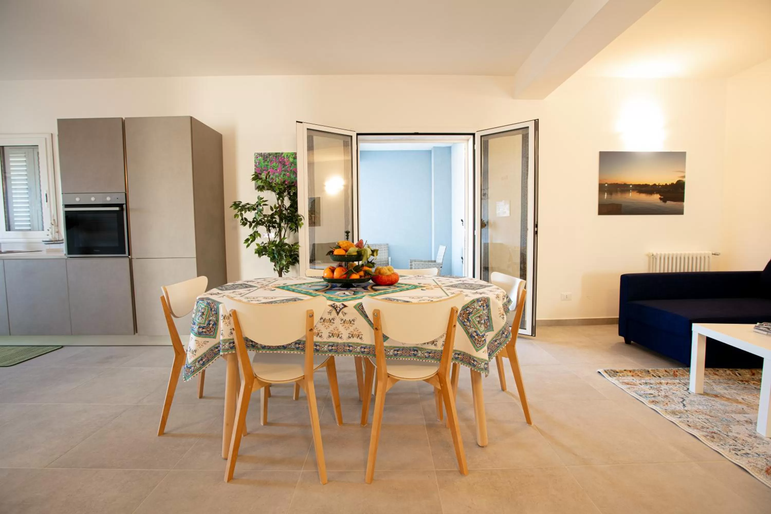 Living room, Dining Area in Etnamare Brucoli